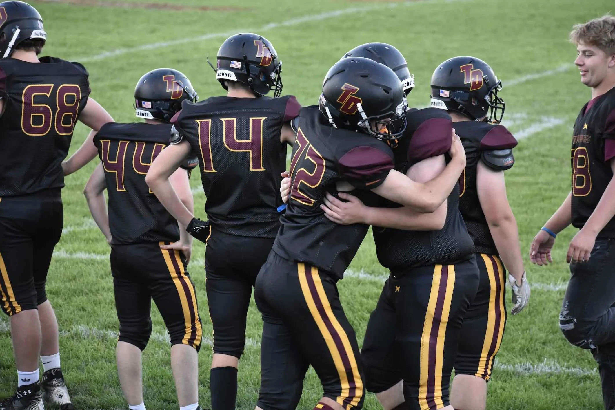 The Riverhawks on the field at Homecoming.