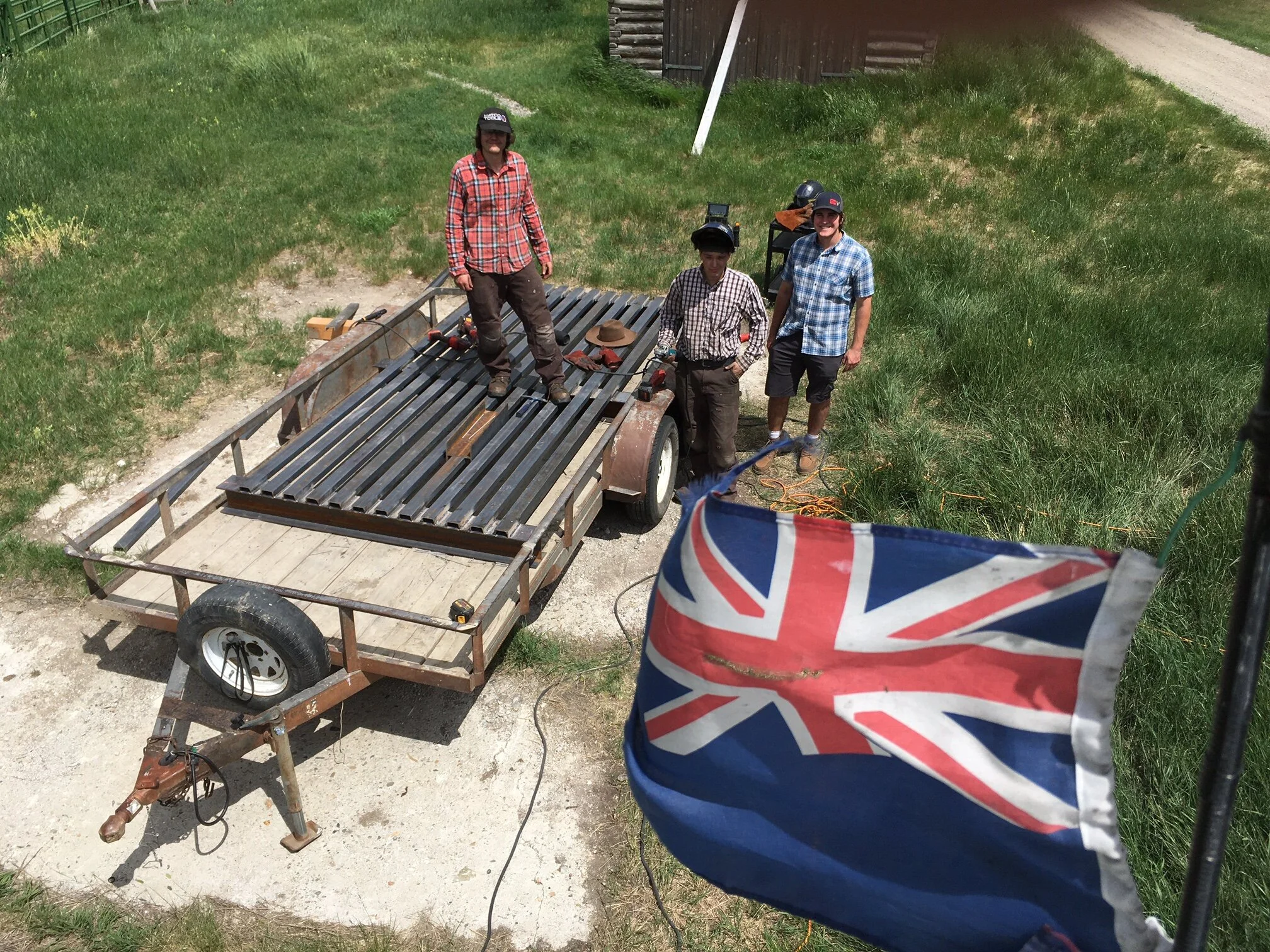 Michael Snell and Jack Chater ( Metal Medics LLC) and Michael's brother Mark building a new cattle guard for the main gate (in case you are wondering.........it is a Falkland Islands flag!), June 