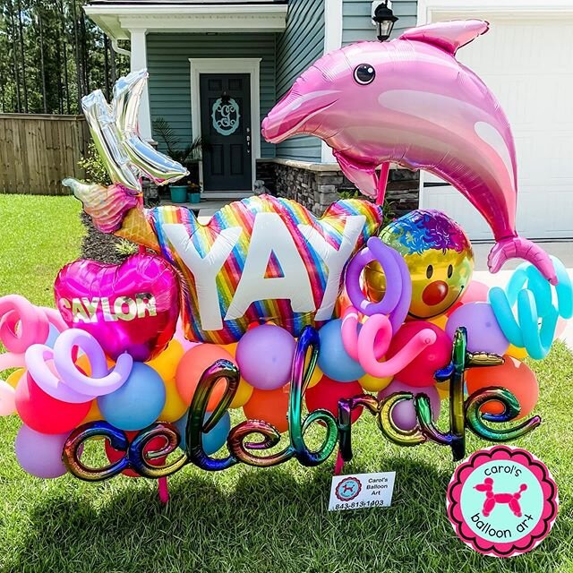 I had a request for a fun yard display to help celebrate this sweet little girl finishing kindergarten.  Her mama said she loves pink dolphins, so guess what I found? This was a lot of fun to make! #balloonmarquee #balloonart #yardart #charlestonsc