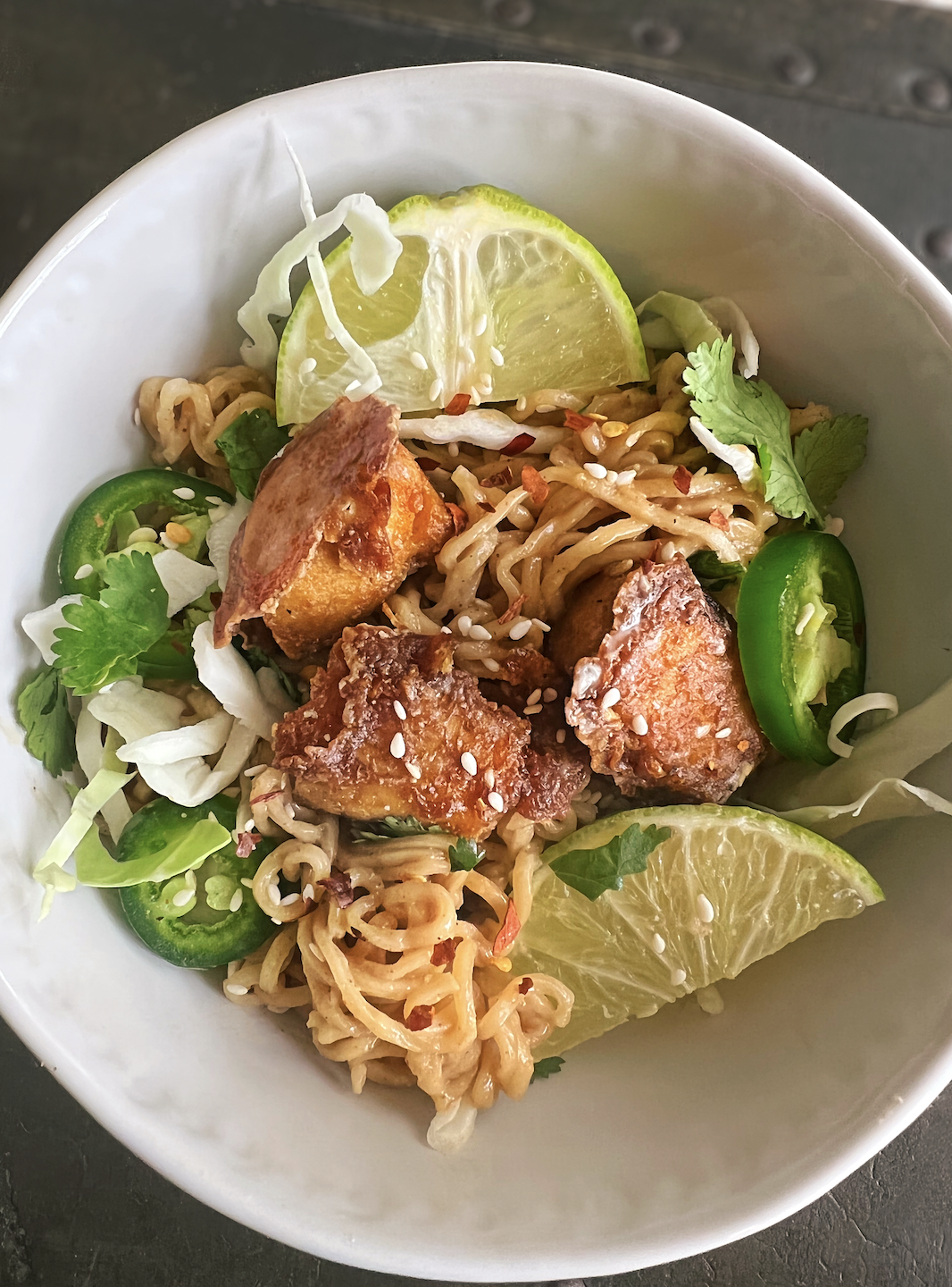 Ramen noodles in a peanut sauce with crispy tofu (vegan)