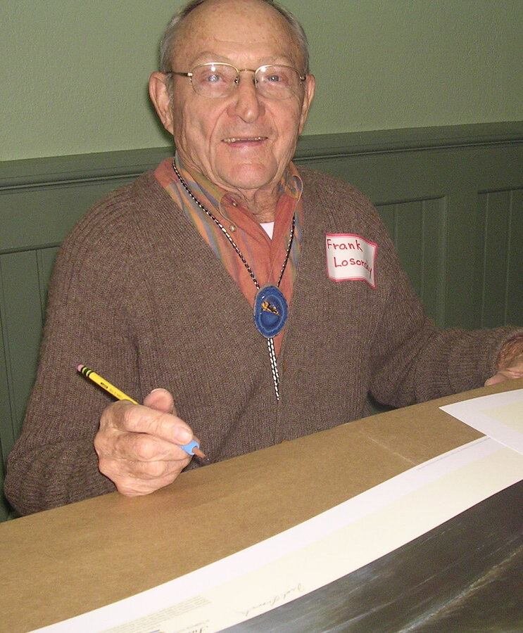  Frank in 2004, Orlando Florida, signing prints of “Summer of ’42” 