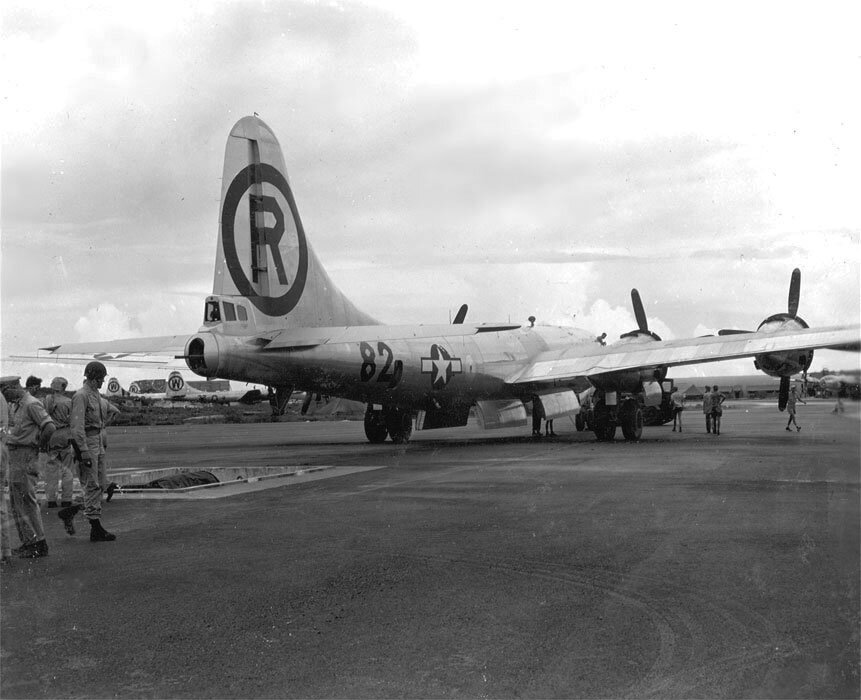Enola Gay is backed over the bomb-loading pit on Tinian t