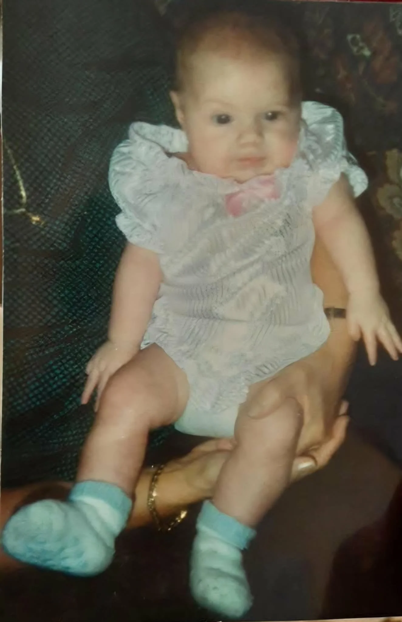 Destiny was around 10 months old here. Fun fact, we still have that outfit in her baby box.&nbsp;
