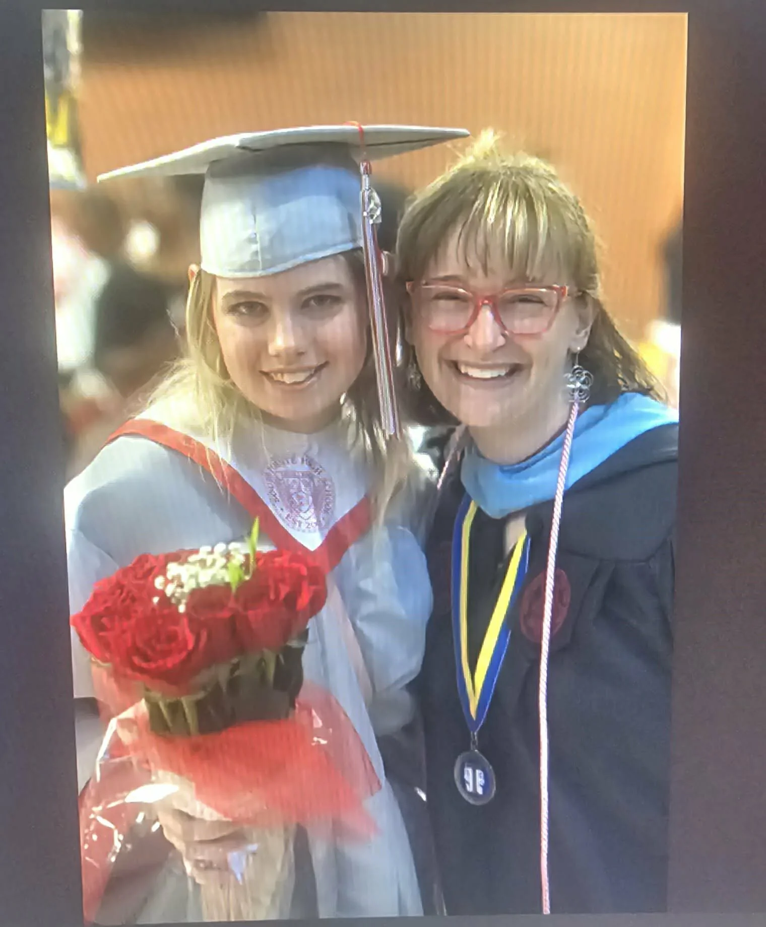 Destiny with her favorite high school teacher and dance teacher, who truly understood her, supported her through difficult moments, and recognized signs of autism when others did not.