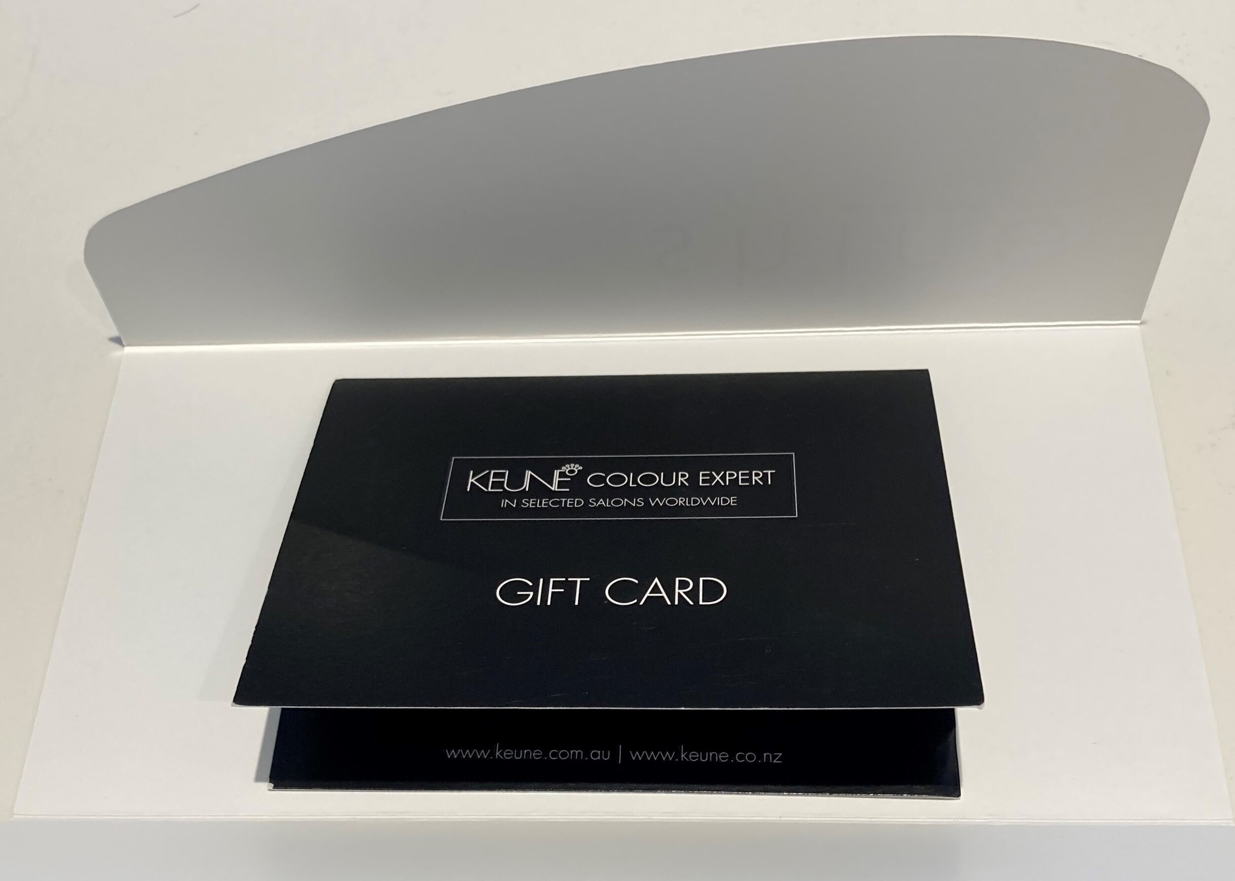 Gift card placed in folder.jpg