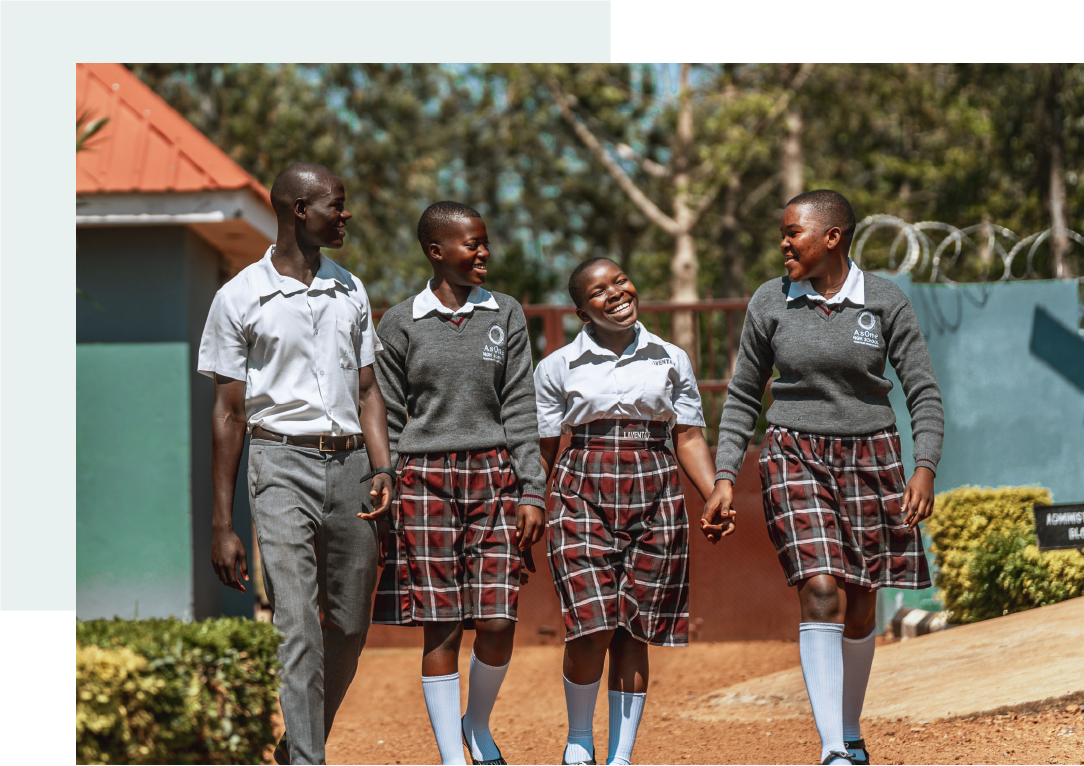 AsOne High School, Namayemba students in uniform smiling and walking together on campus
