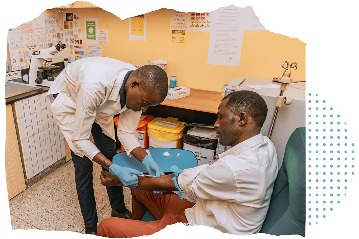 AsOne health worker drawing blood from a patient in a medical laboratory