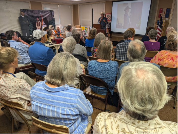 Clayton Tucker, Democratic candidate for Texas Agriculture Commissioner, addresses the October monthly meeting of the Gillespie County Democratic Association