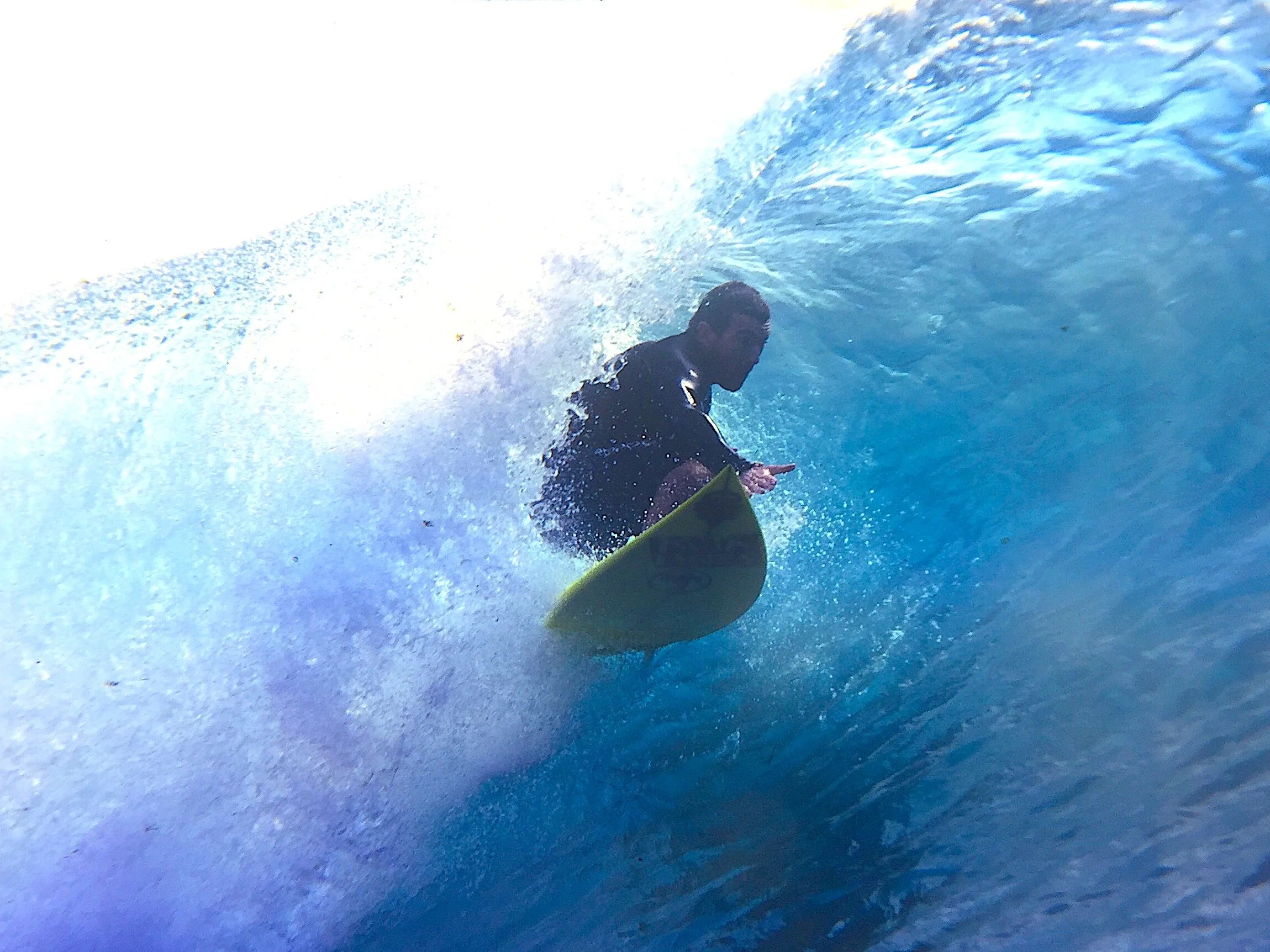 Dave Davidson hanging on by a fin as he flies out of the barrel at Lakey Peak Sumbawa. Marty's positioning to get this shot must have been super critical