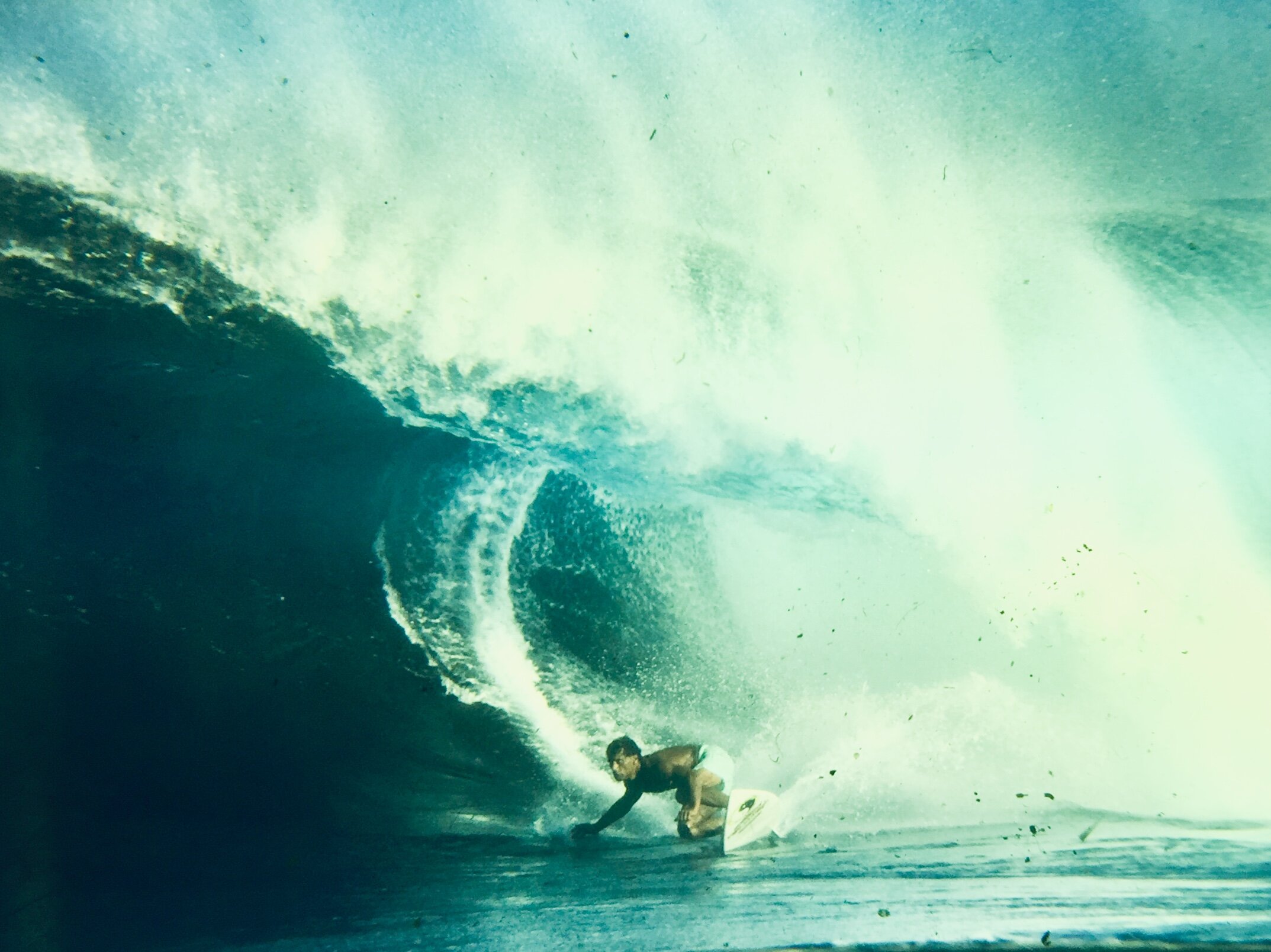  The great Hawaiian Dane Kealoha leaning low into a cavernous Backdoor section  