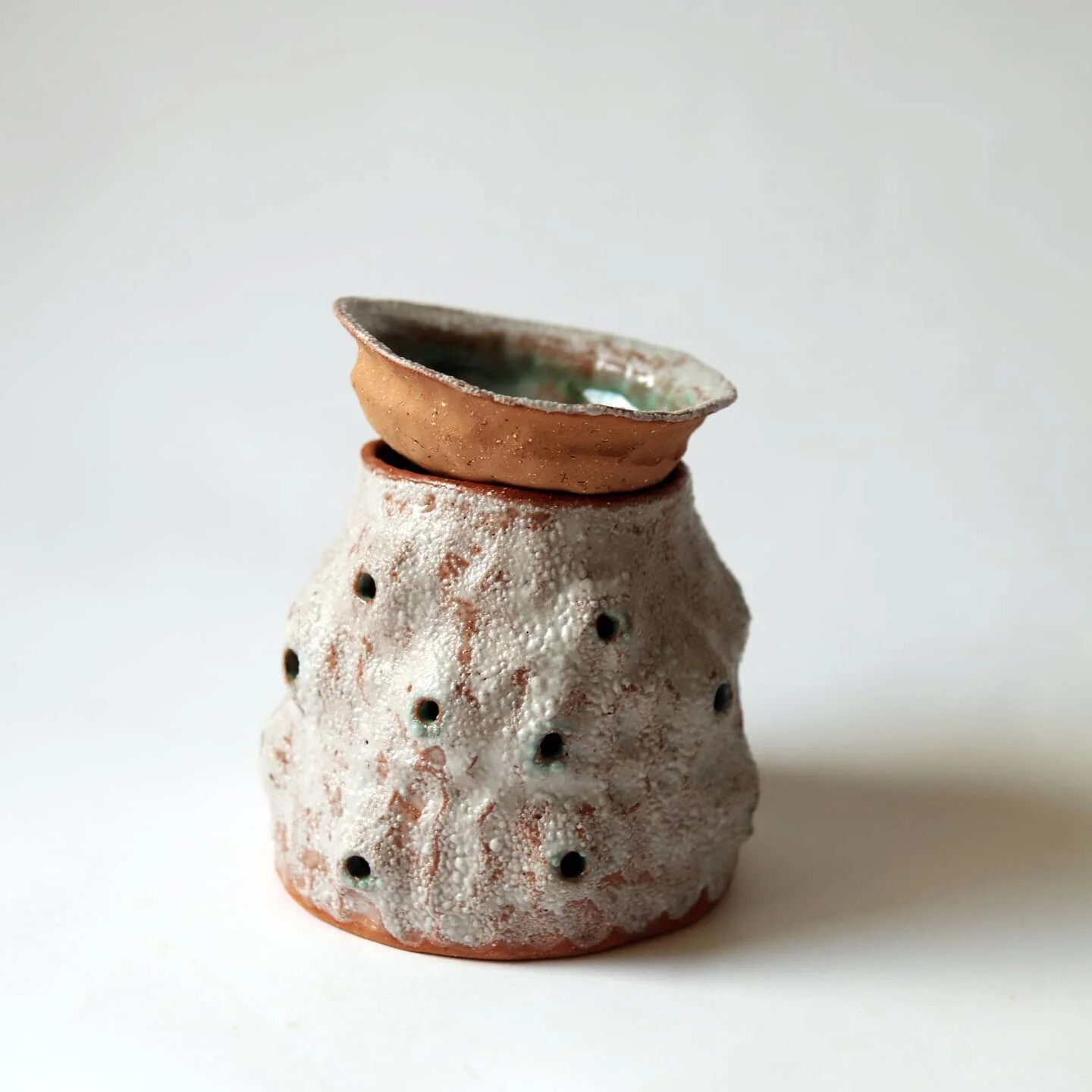 A few aroma diffusers up on my website 👃
www.lotteschwerdtfeger.xyz
(link in bio) 
Coral aroma diffuser, stoneware with green and bubble textured white glaze 
For use with oil and/or water with small candle

2019