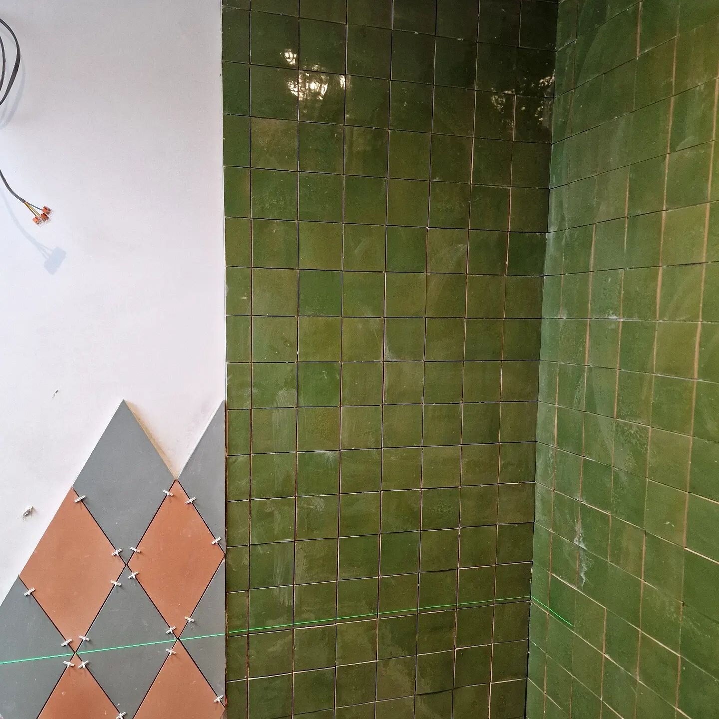 A loft bathroom in progress. We love, love tiles. Playing with texture, scale and shape in this small space to give it some character and oomph. 

The loft room adjacent is going to be wrapped in a slightly bonkers floral wallpaper. Can't wait to sha