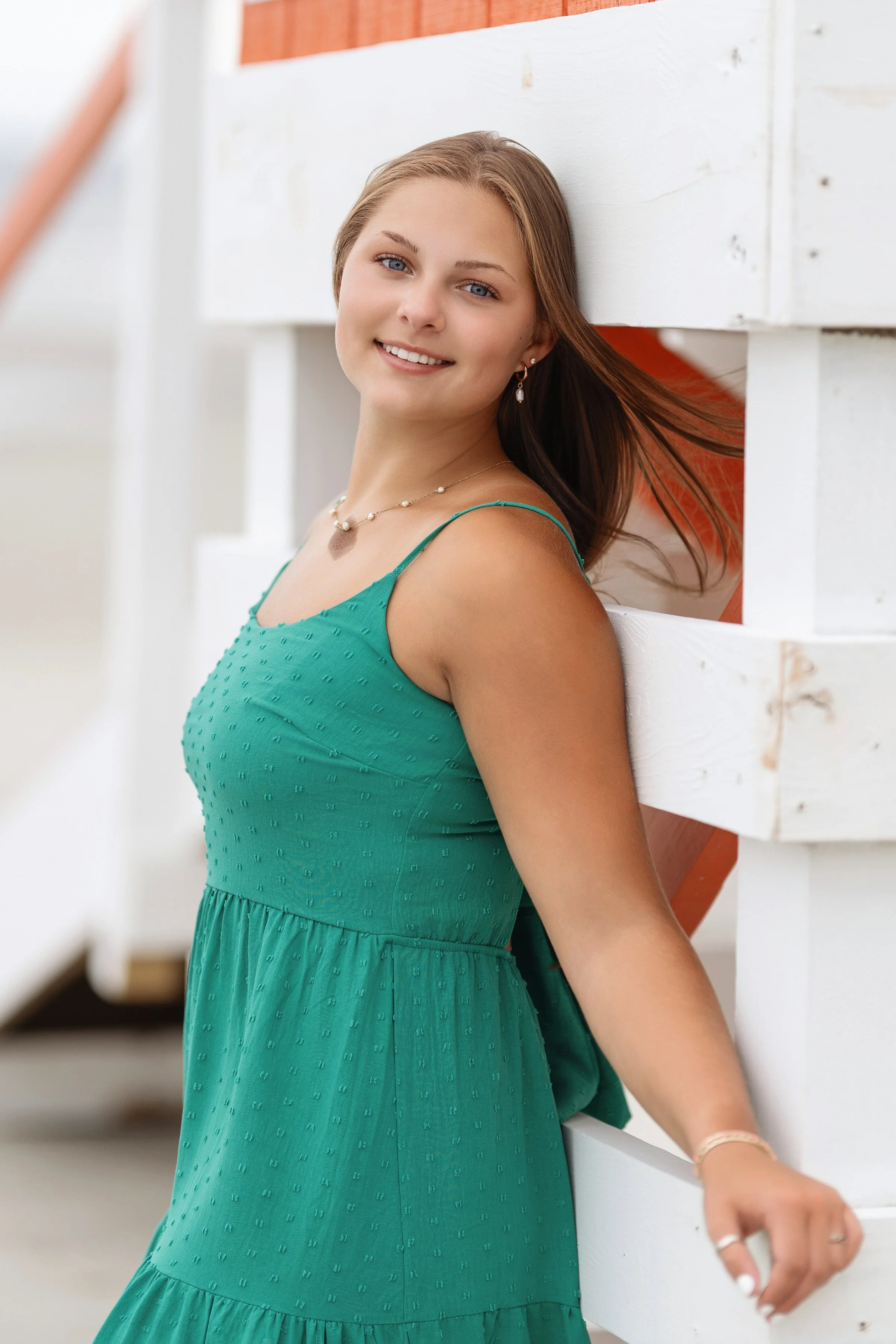 Myrtle Beach senior photographer capturing fun, movement-filled portraits with natural lighting. 