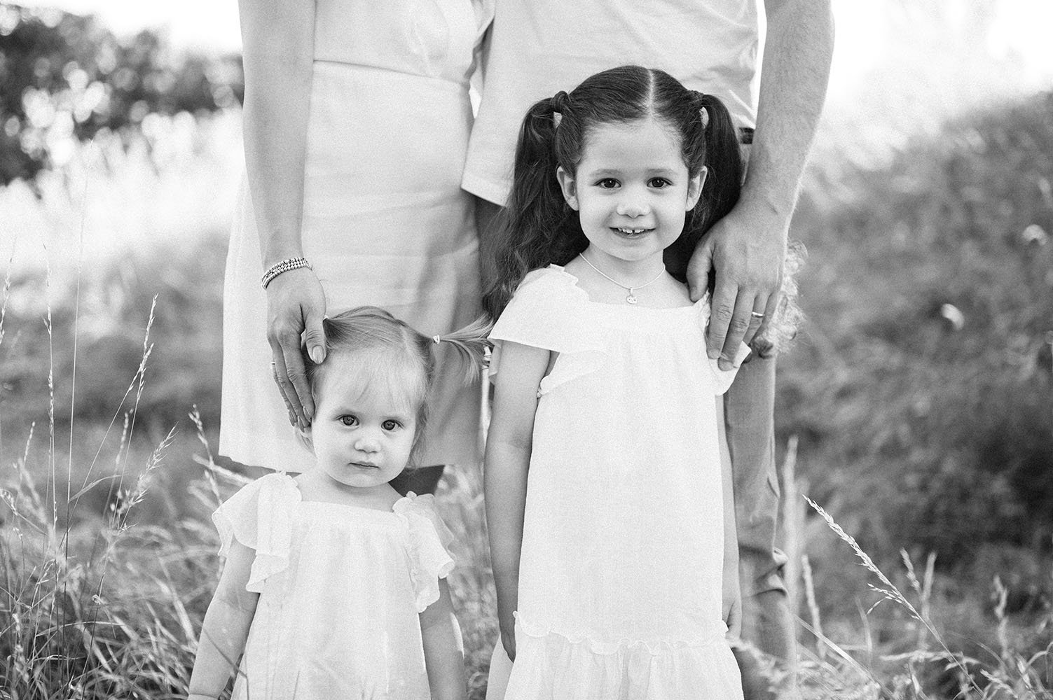 Fotografia famiglia piccole bimbe crescono