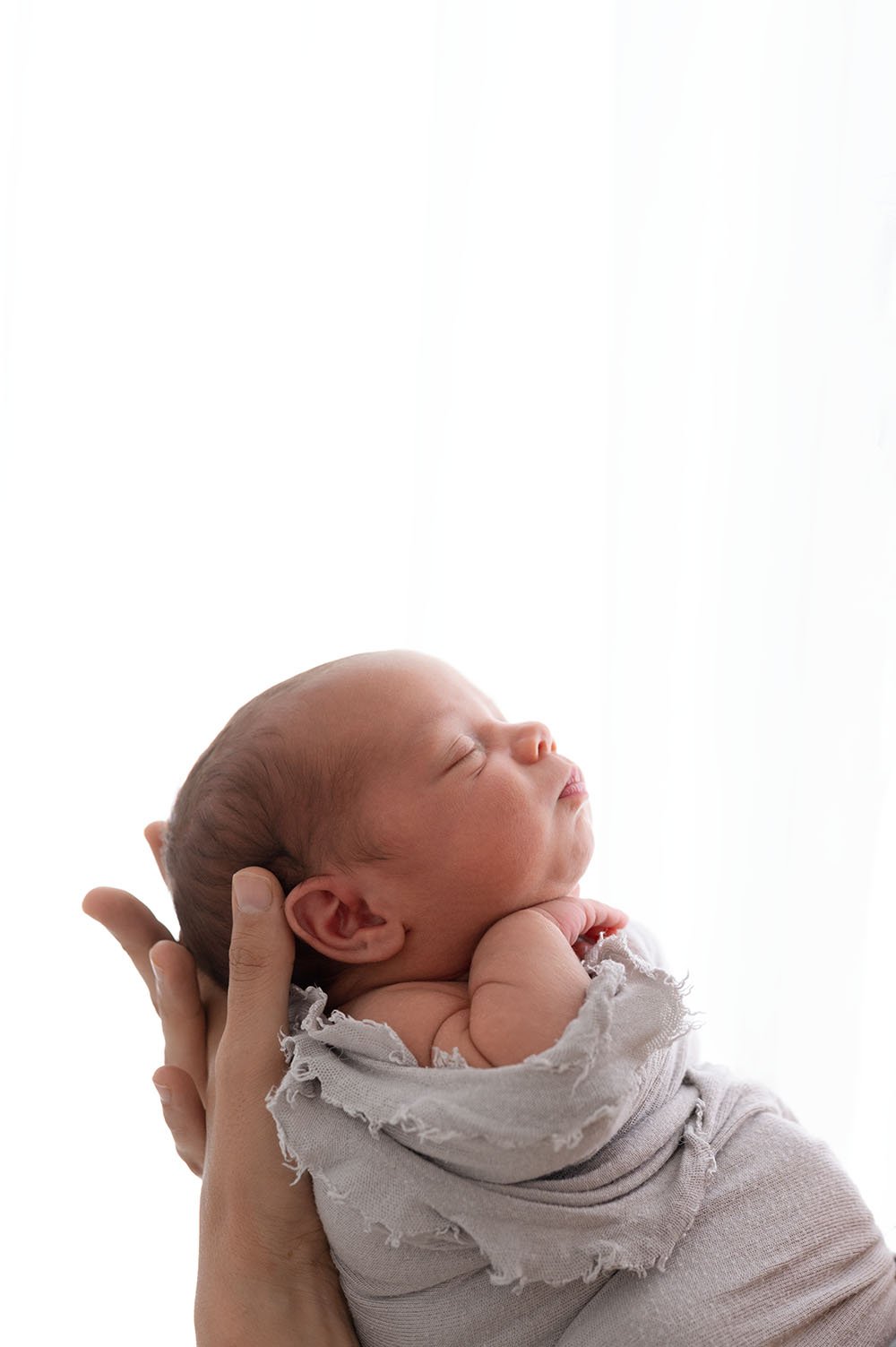 Fotografia neonato dorme tranquillo