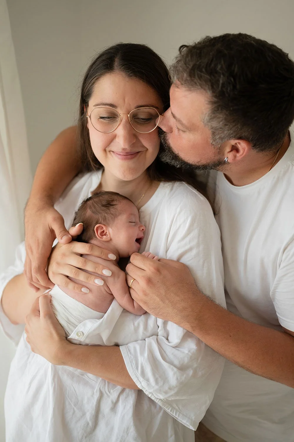 Fotografia neonato moglie e marito