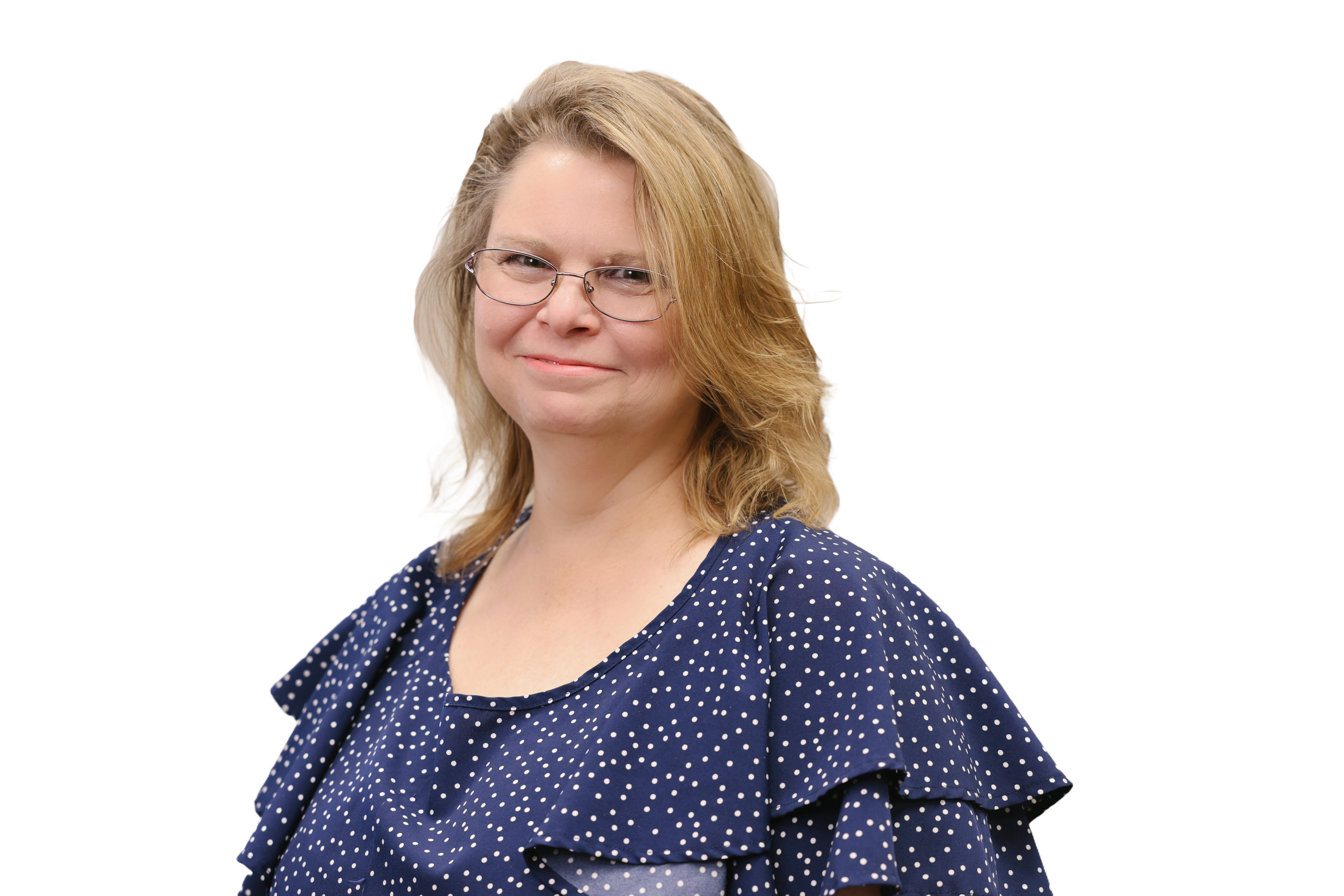 Program Analyst & Special Projects Coordinator, Rhonda Harris, with blonde hair wearing glasses and a blue polka dot blouse, smiling against a white background.