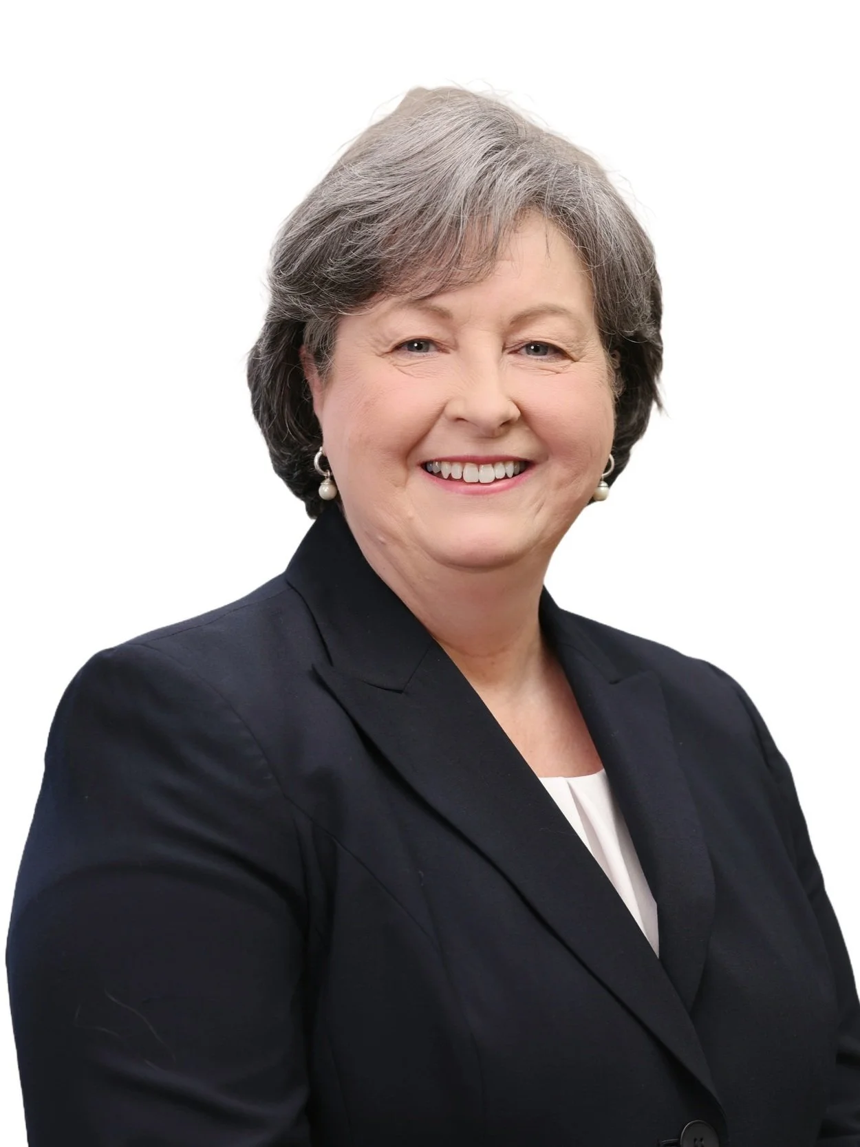 Executive Director, Mrs. Becky Hull, in a business suit with short gray hair on a white background.