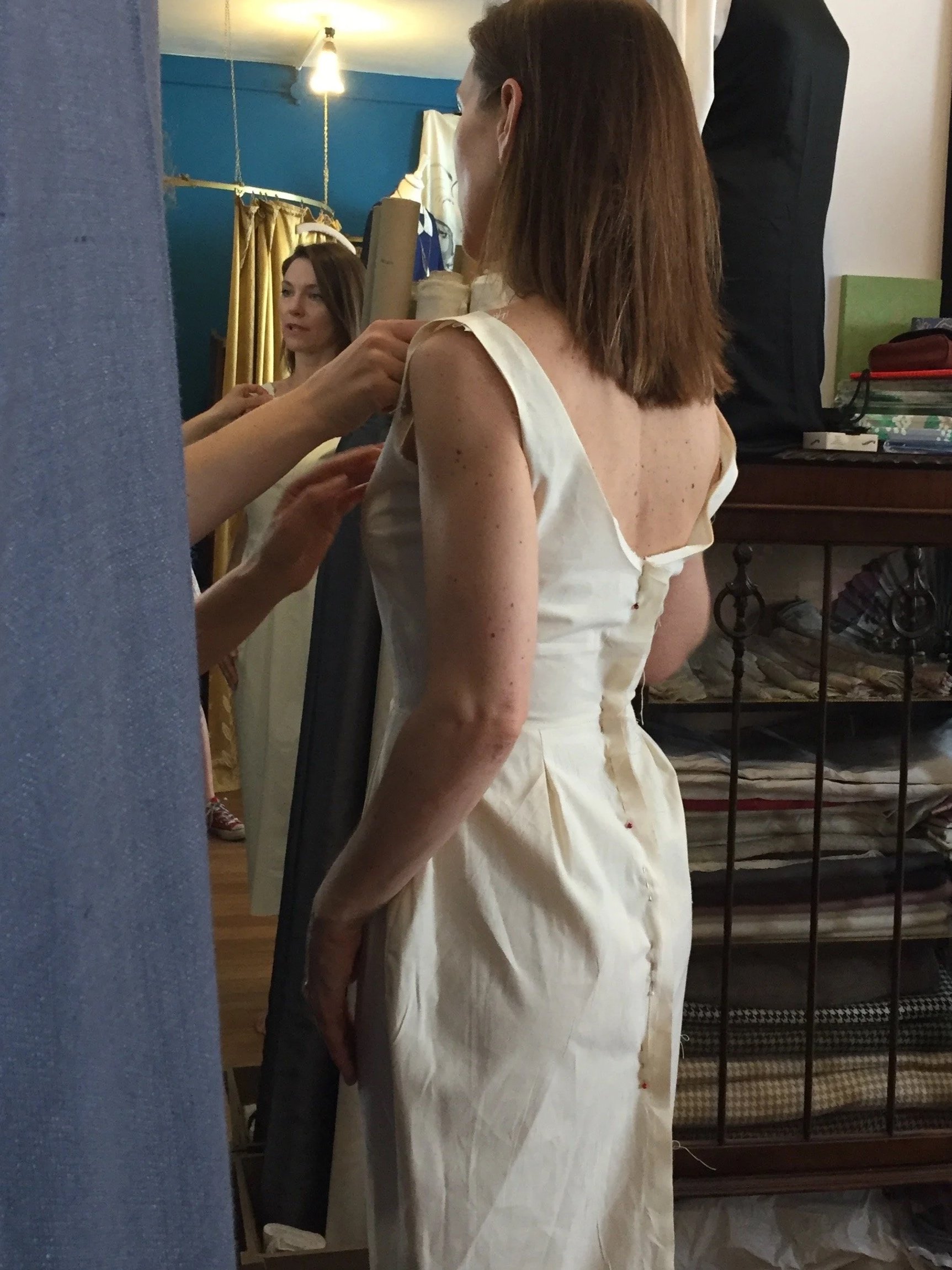 A toile is created, in organic cotton calico or muslin, of each design to check the fit and line, and ensure we have the correct proportions of the design to fit each individual body shape. 