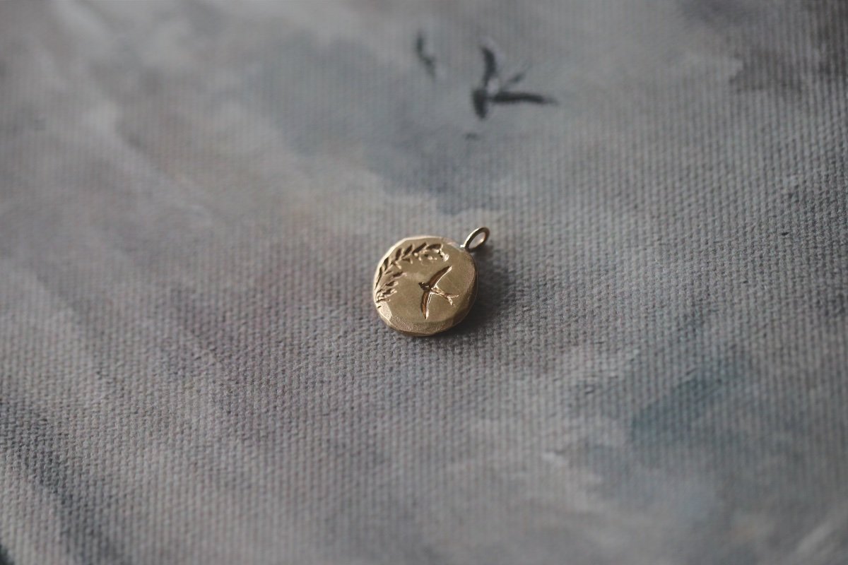 Folklore Swift Pendant 1.jpg