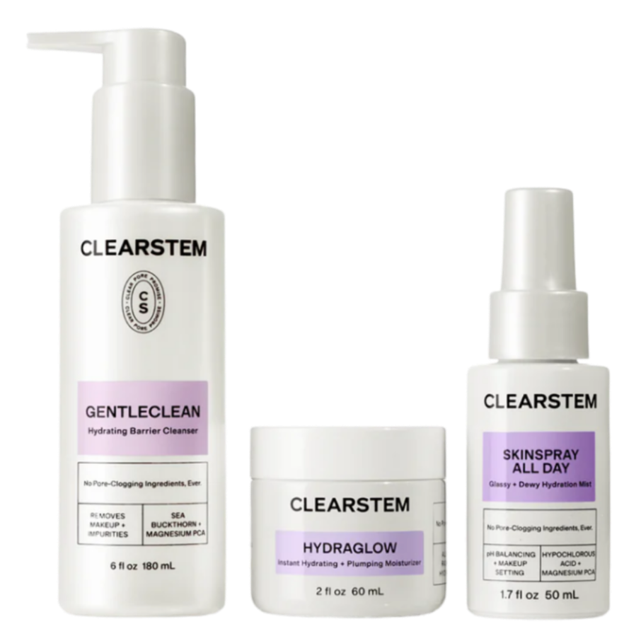 Skincare products including a vitamin scrub, clarity serum, and hydraglow moisturizer on white shelves.