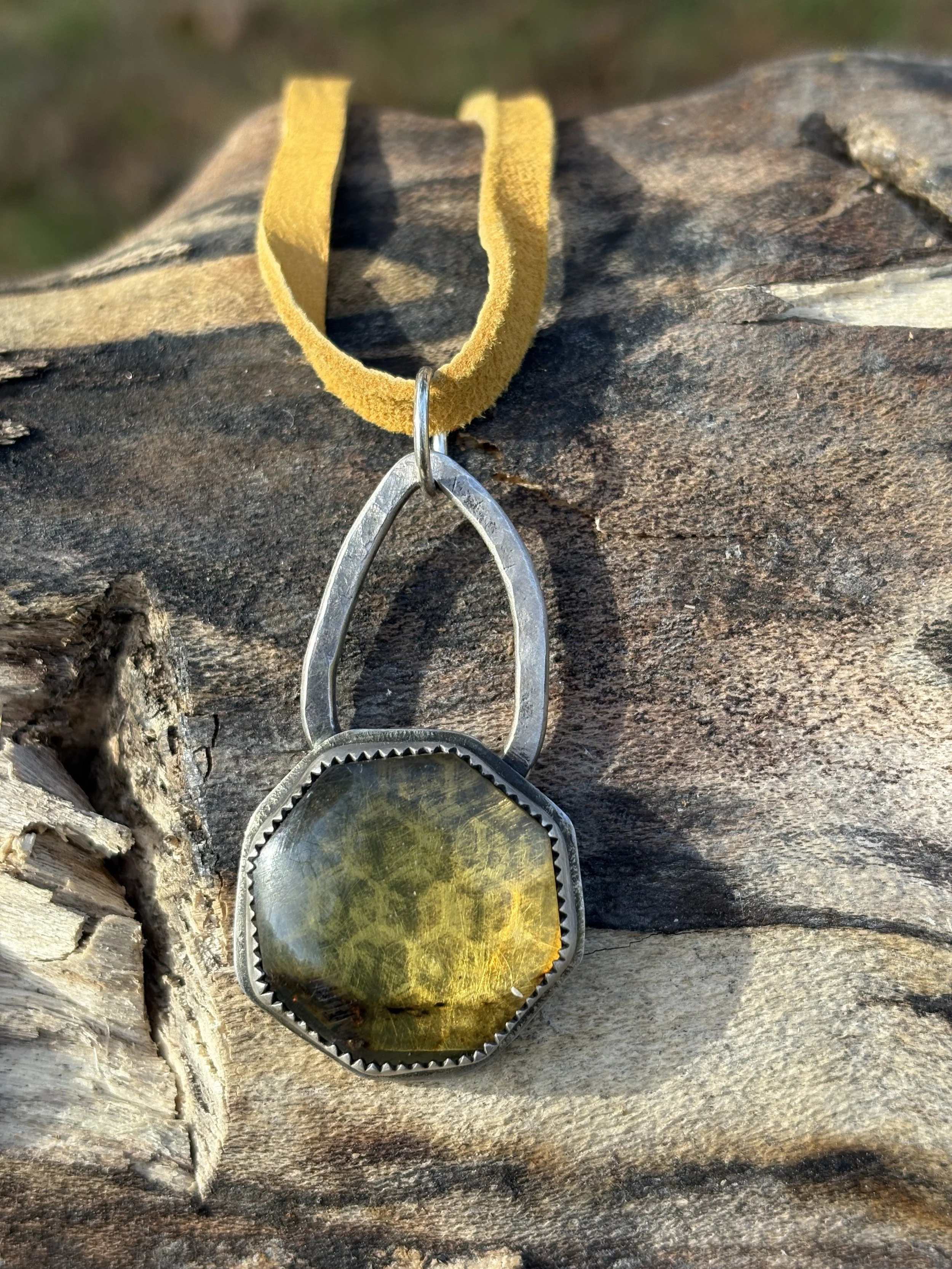 amber honeycomb sterling silver pendant on leather 