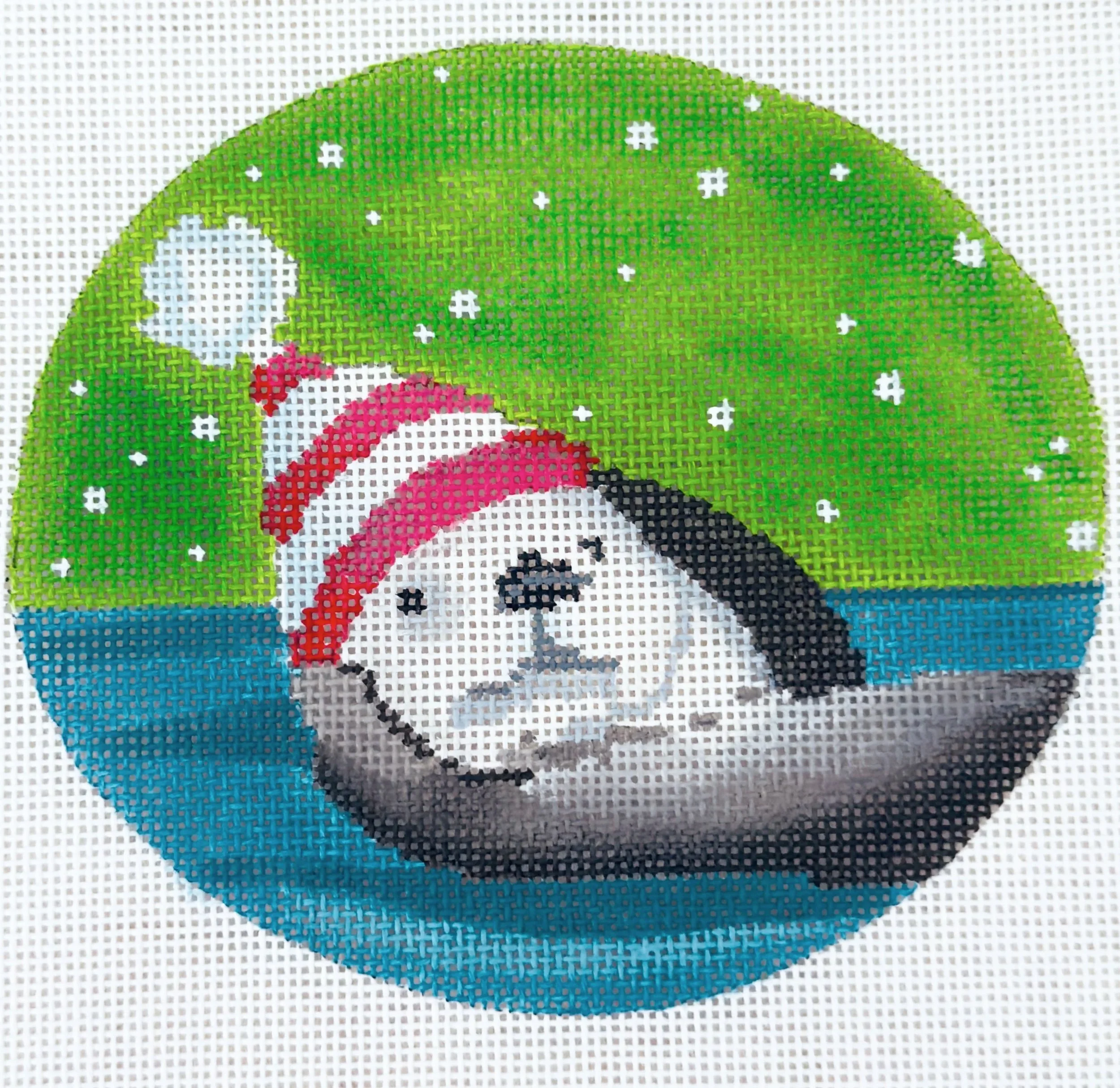 This 18 mesh canvas measures 4.5 x 5 inches oval.