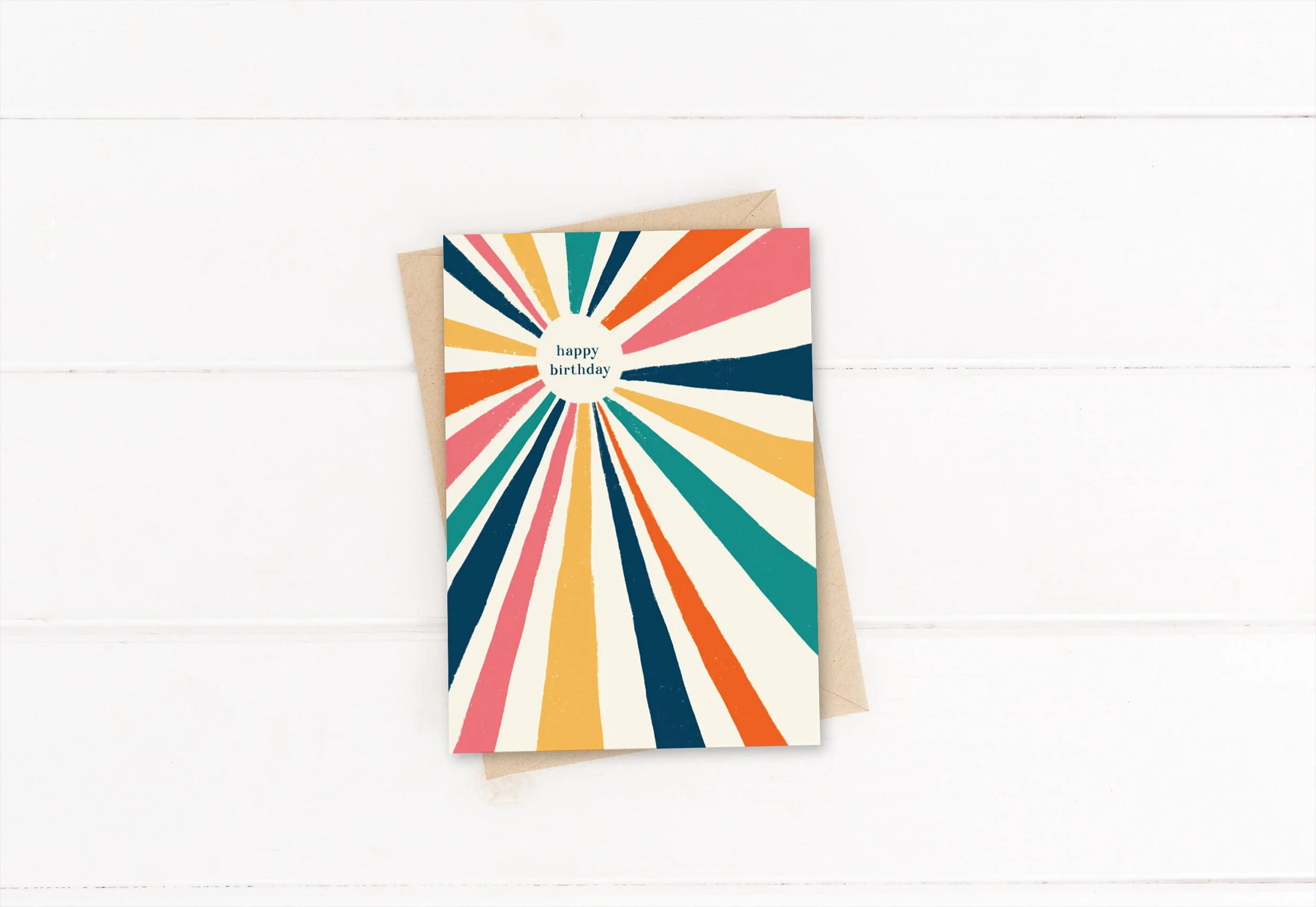 Colorful birthday card with radiating stripes and 'happy birthday' text in the center on a white background
