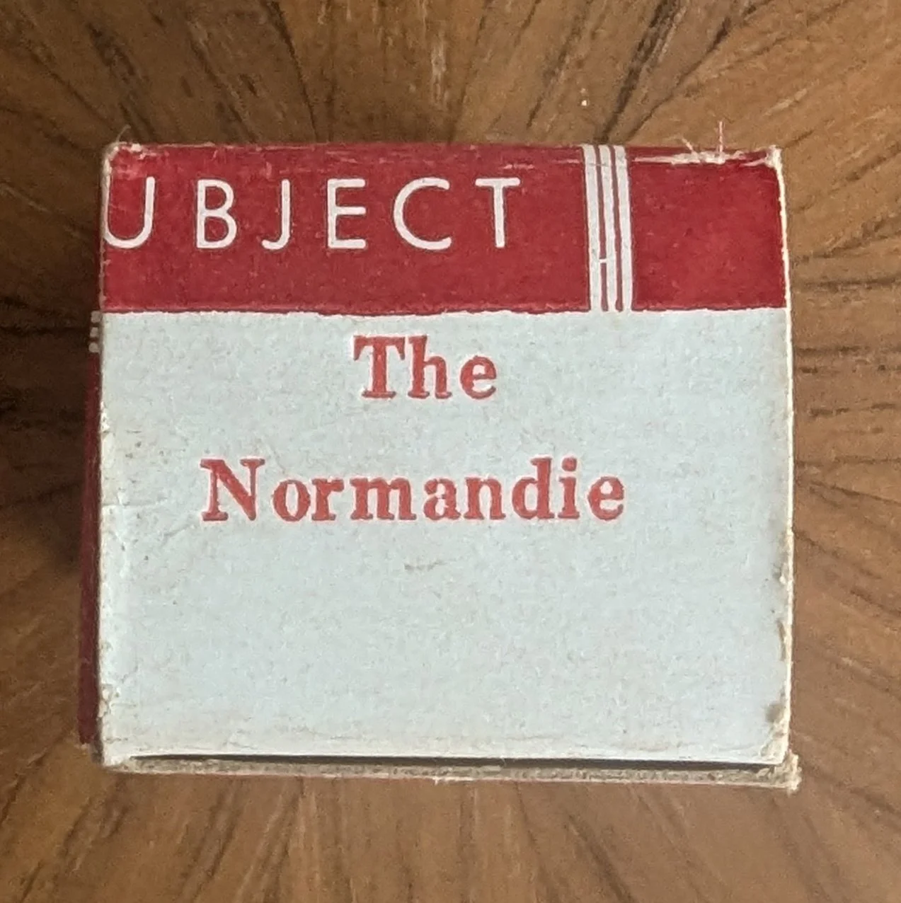 This box has been cut incorrectly but still got folded into a filmstrip box.