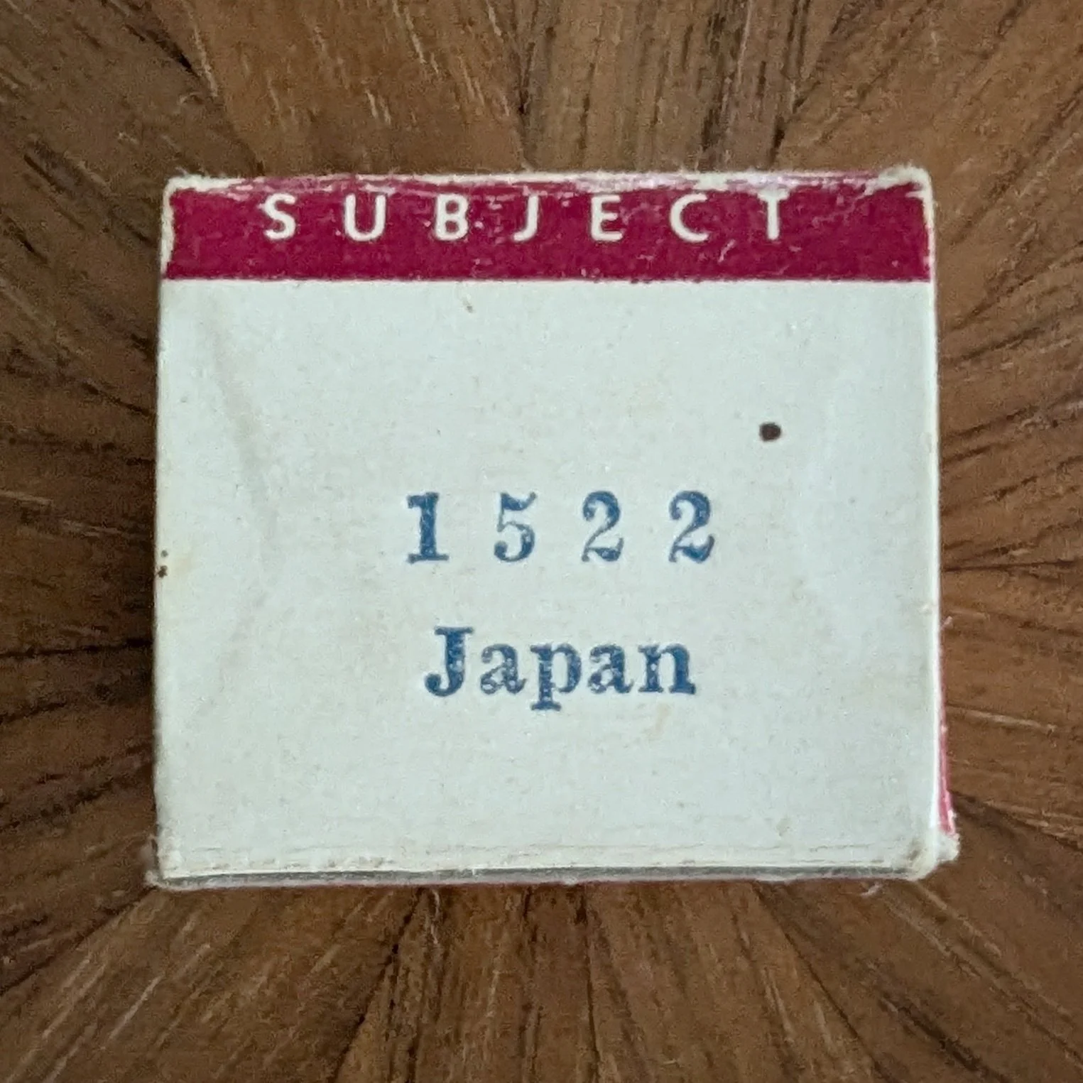 Box #5 (variation). Blue typeset serif film number and title.