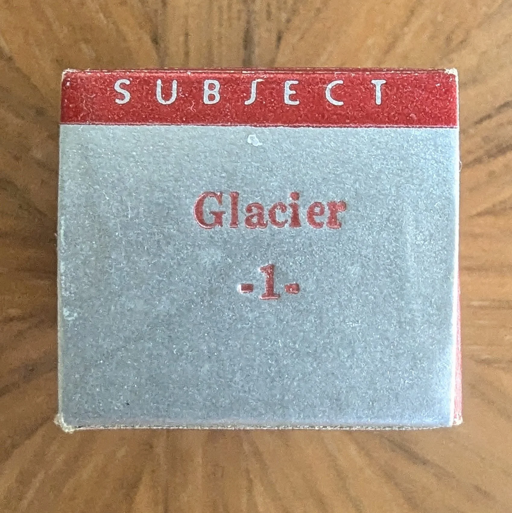 Box #3. Silver piano. Carrying over the red typeset.