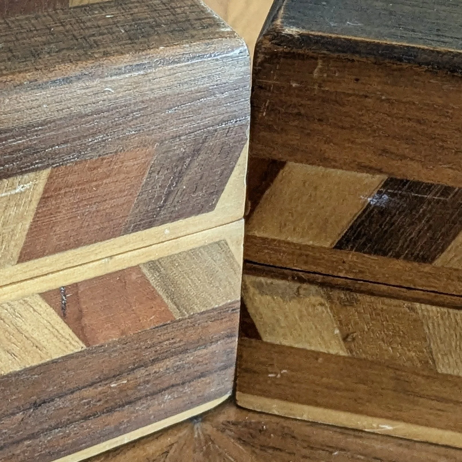 One case opening is offset towards top (left), the other case opening is in the middle