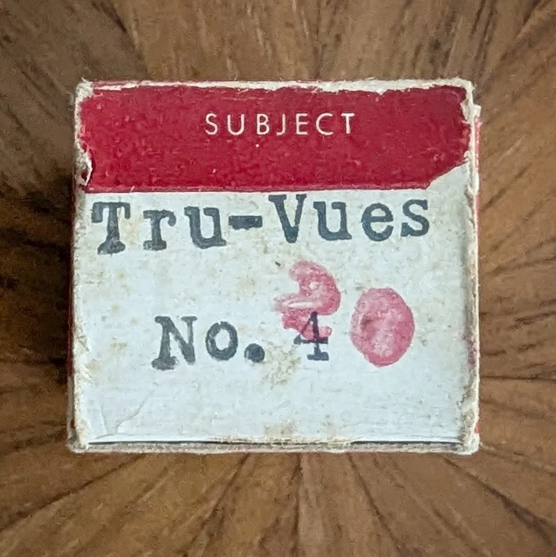 Box #2 (variation). Abandoning the natural buff white box color for bright white. Black serif stamped title.