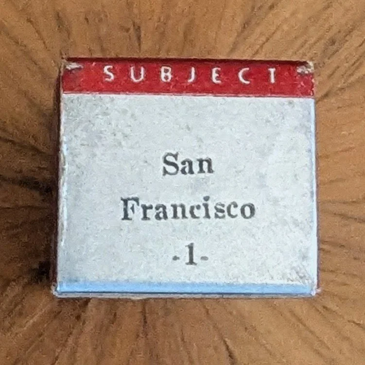 Box #3 (variation). Silver piano with black type but no number.