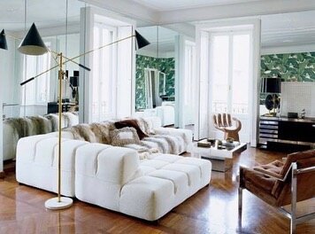 Brian Atwood&rsquo;s apartment in Milan was renovated by architect Matteo Bermani and designed by Nate Berkus. This beautiful apartment is all about 1970s glamour and chic. I, for example, love the 1970s mirrored cocktail table and the vintage hand c