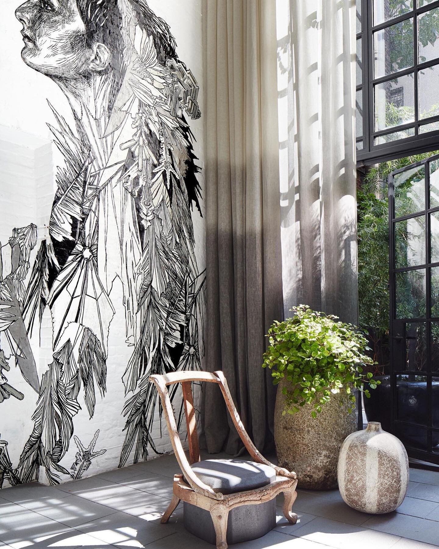 Today&rsquo;s post is from Monique Gibson&rsquo;s own New York townhouse. Wall mural by Swoon is accompanied by a James Plumb sculpture chair in the hall. Opposite the mural is the beautiful, airy open kitchen featuring a pebble desk by Gal Gaon that