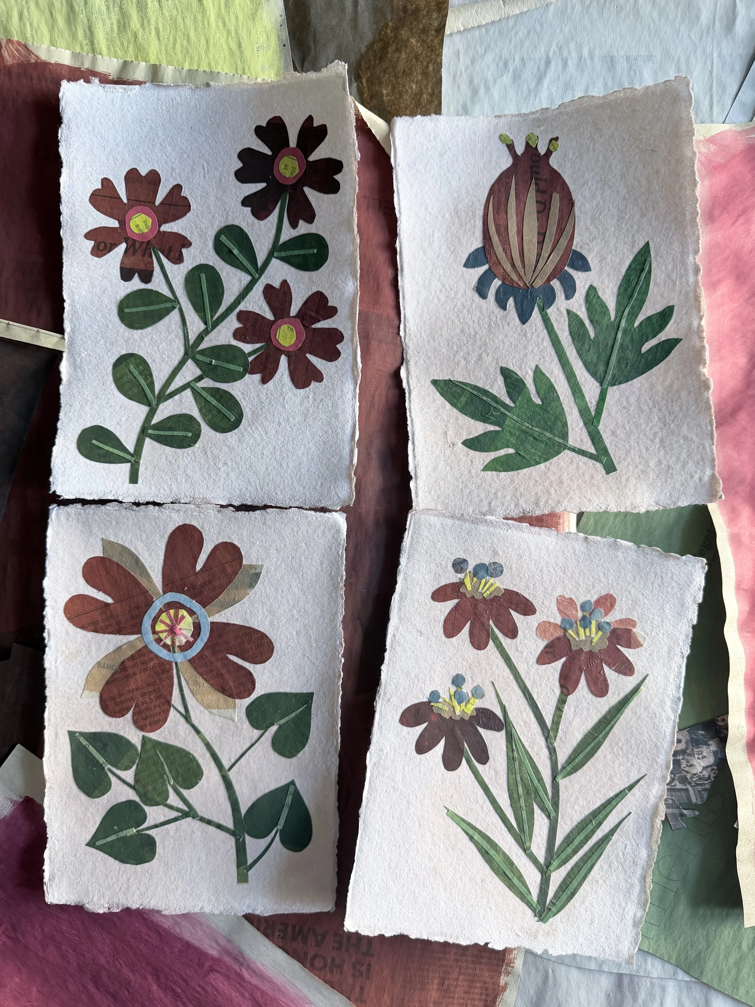 Handmade collage of flower cutouts on textured paper, featuring various flower shapes with leaves and petals in green, brown, red, and yellow colors.