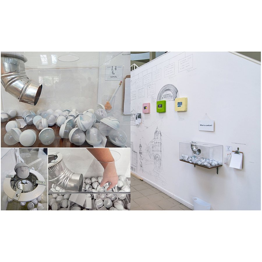 "What is Comfort? / What is Suffering?" 2016-present. Participatory installation (wood signs, plexiglass, plastic toy bubble cups, industrial duct elbow, clipboards, pencils, trashcan). Dimensions variable. Detail.