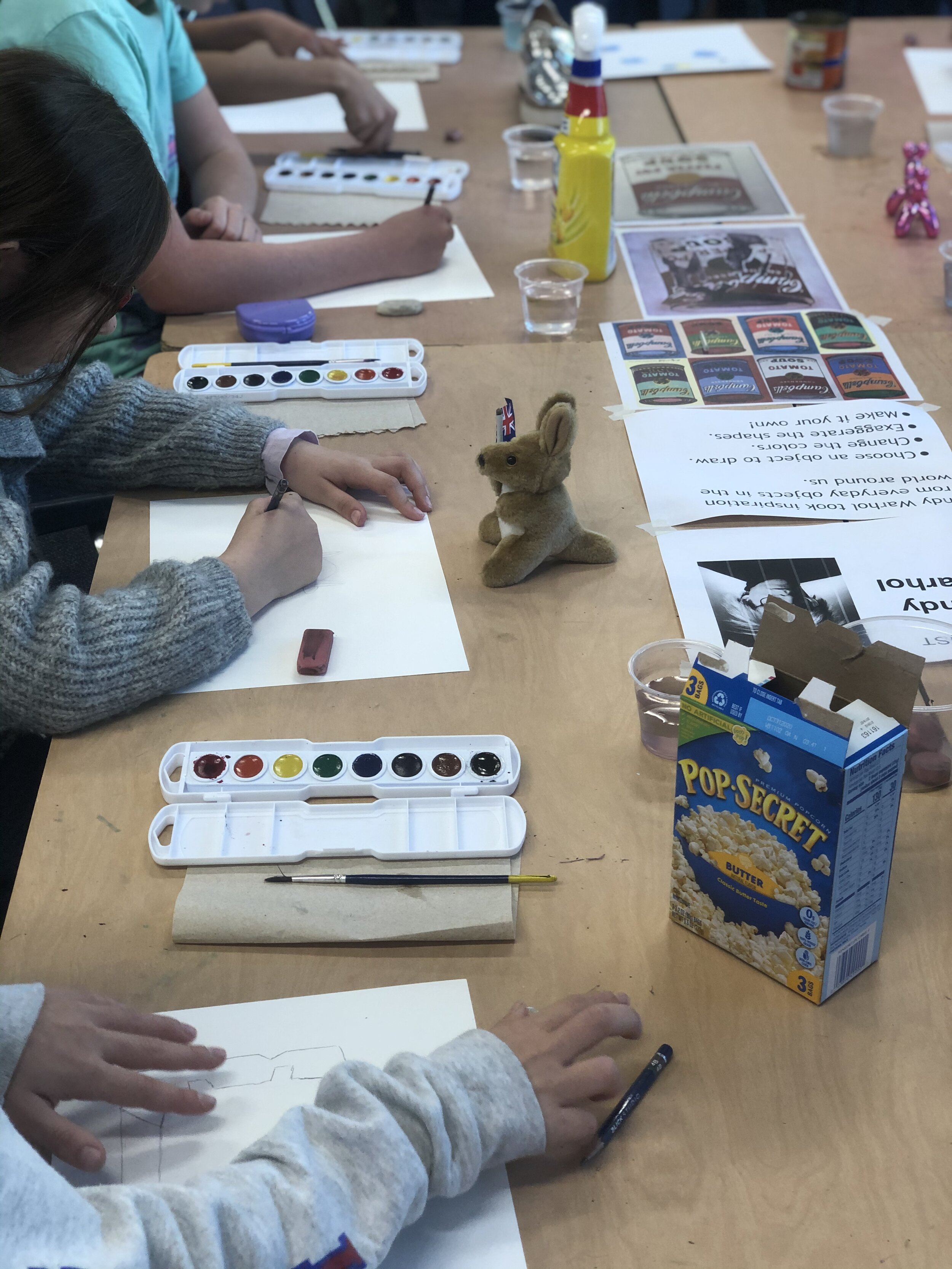 Inspiration Stations: Students explored how artists draw inspiration from different places. After looking at Andy Warhols Campbell’s Soup Can series students created observation drawing of everyday objects and then transformed them using their ima