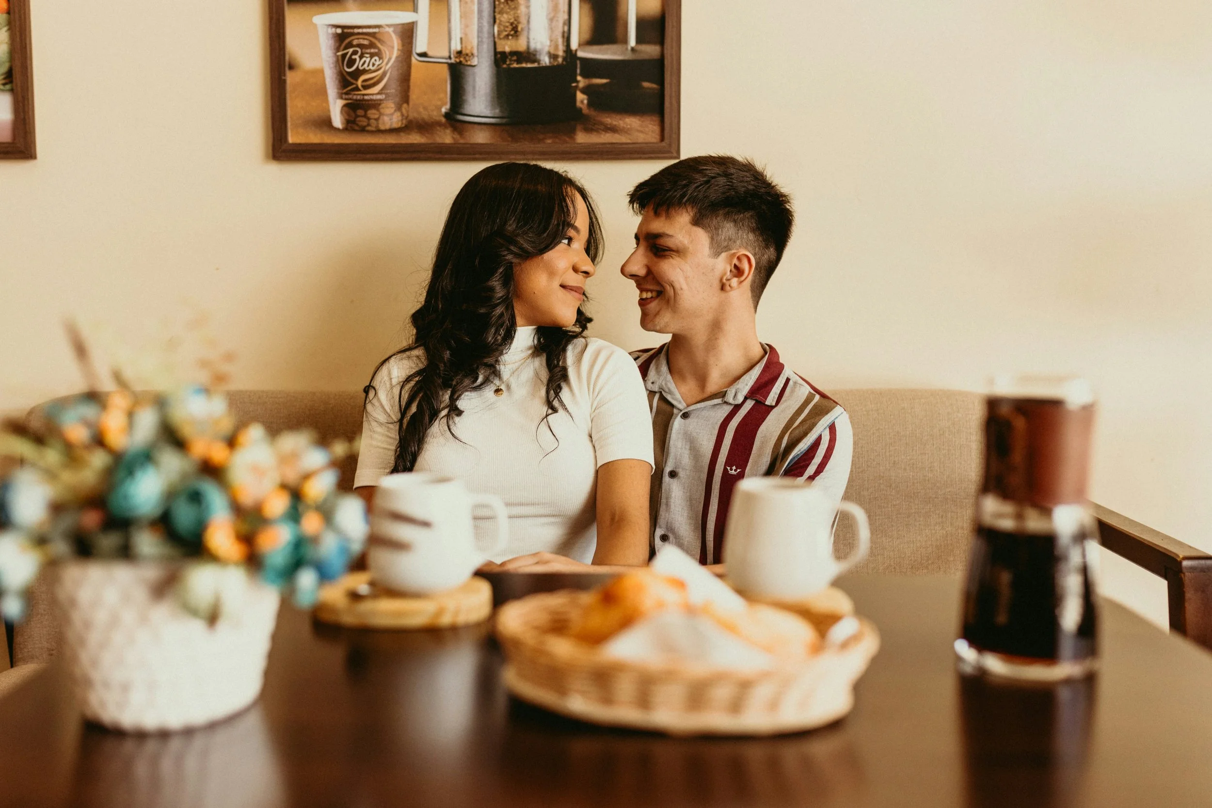 a man and a woman sitting at a table