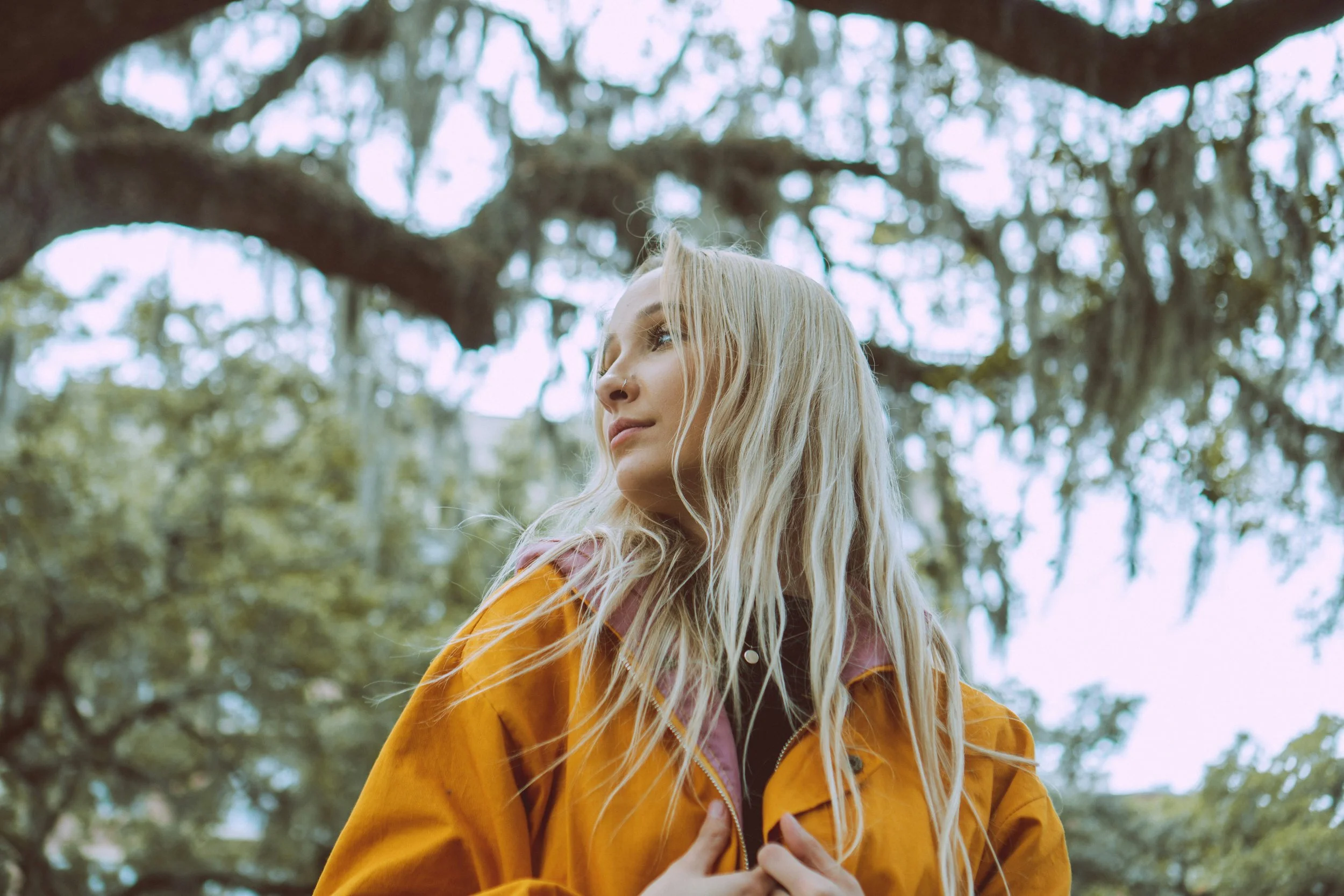 woman wearing a yellow coat