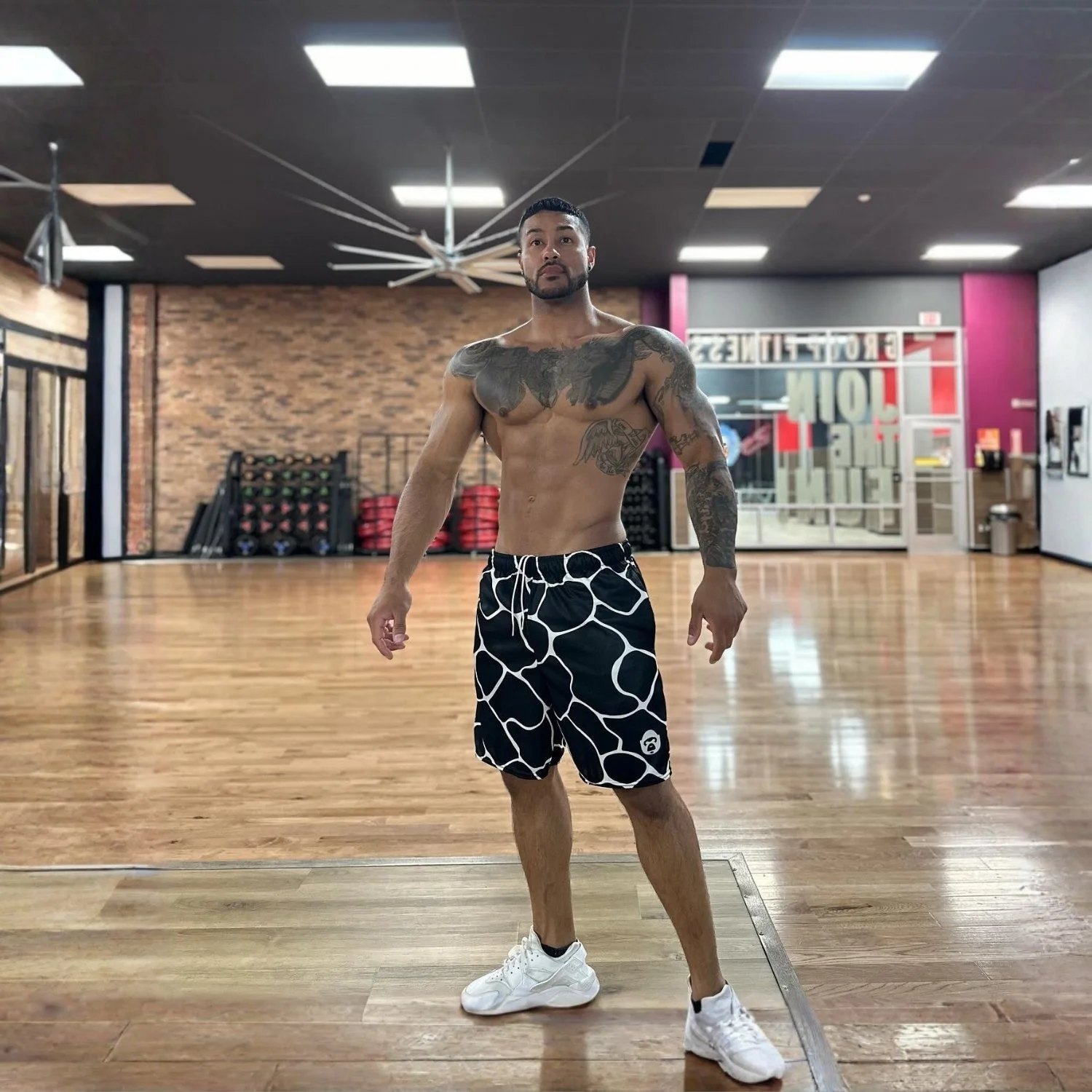 Apesthetics Cement black mesh shorts model view in gym — men's gym streetwear