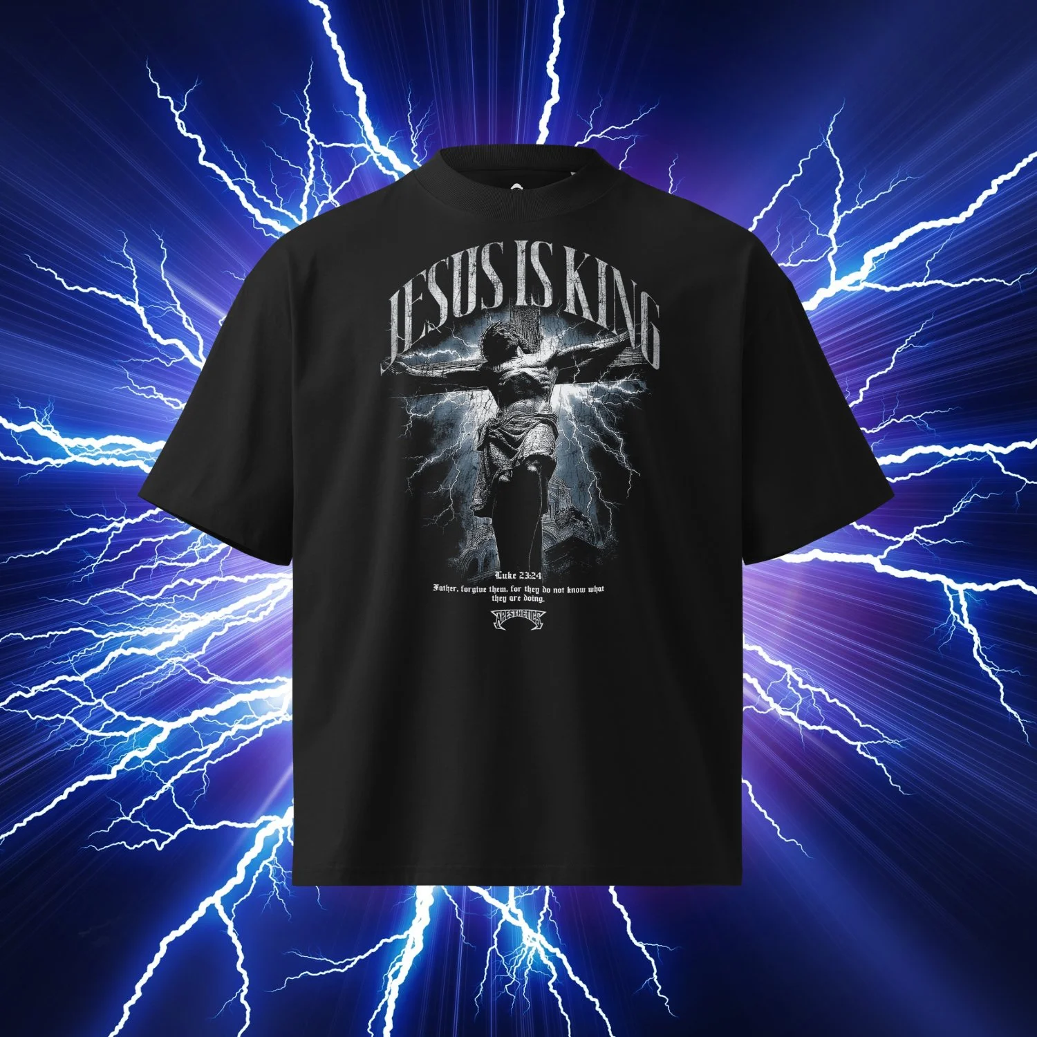 Black Jesus is King t-shirt with crucifixion graphic on lightning background and Luke 23-34 verse, Apesthetics.