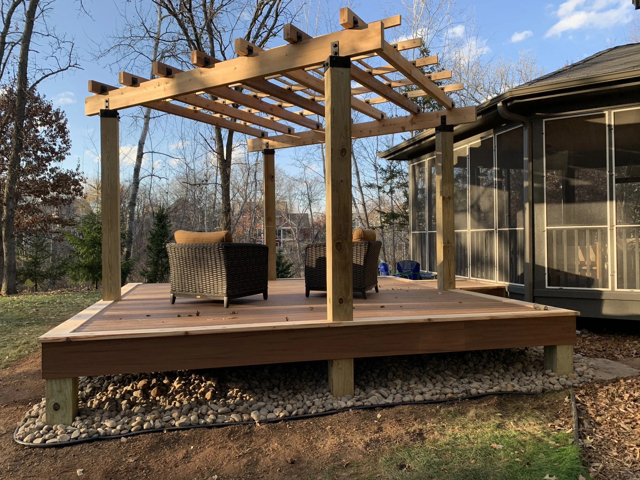 Deck framing and pergola structure built in Stillwater Minnesota backyard