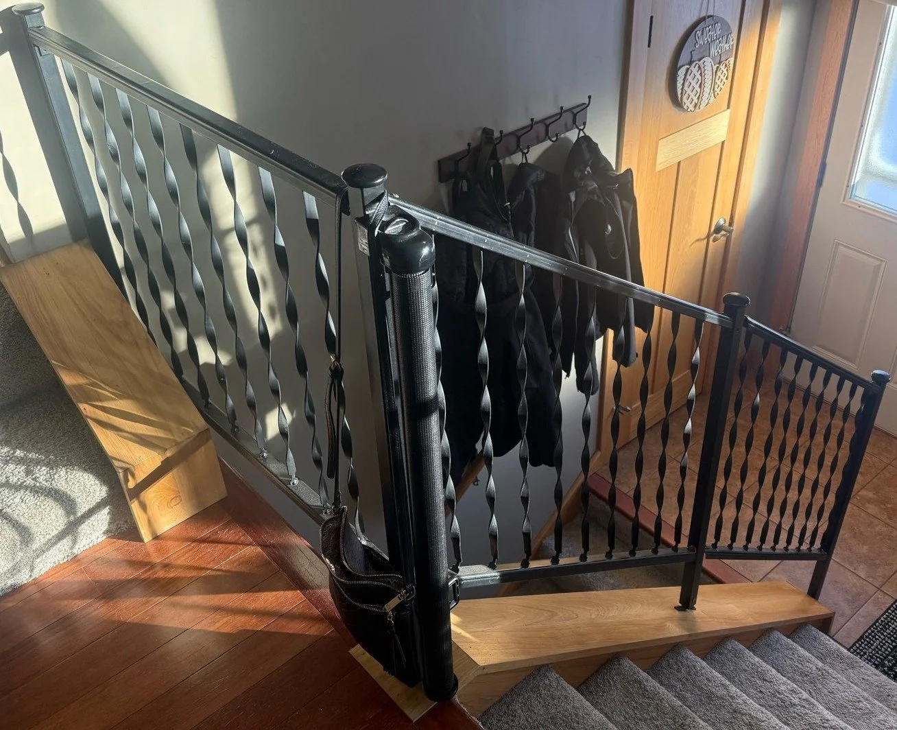 Original stair railing before remodeling project in Fridley MN