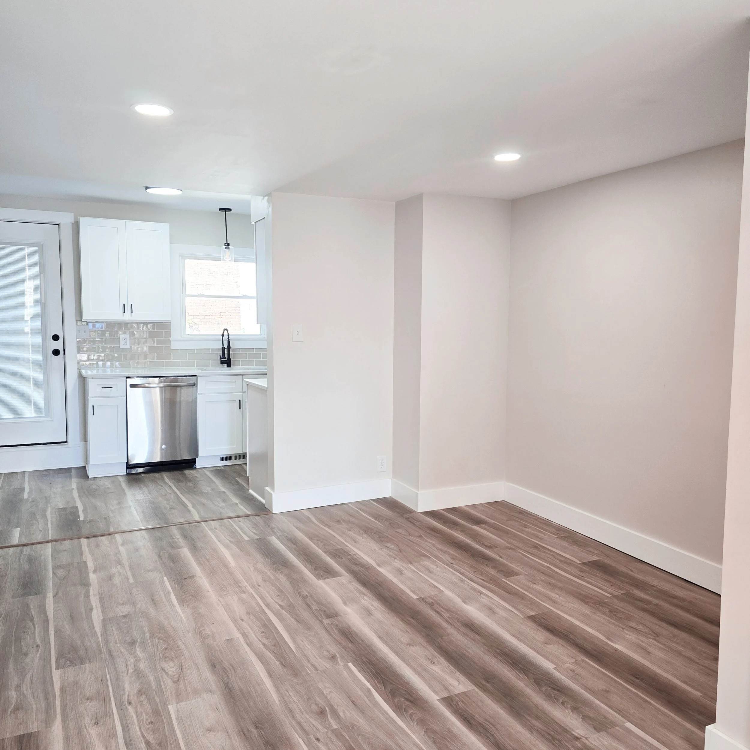 Vacant dining room in a Columbia, PA home before professional staging, showcasing the room layout and potential for transformation.