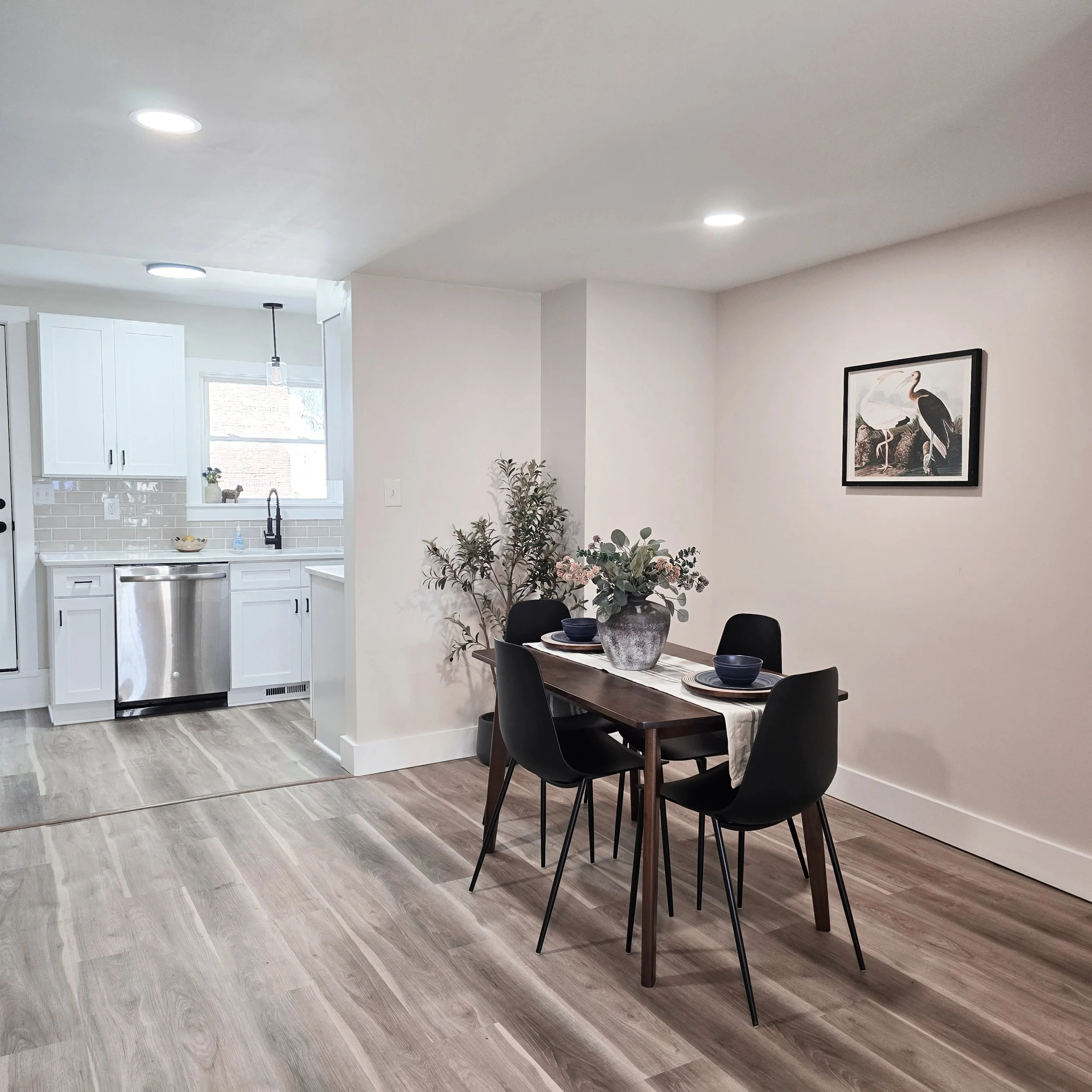 Professionally staged dining room in a South Central Pennsylvania home featuring a beautifully styled table, neutral décor, and an inviting space for entertaining.