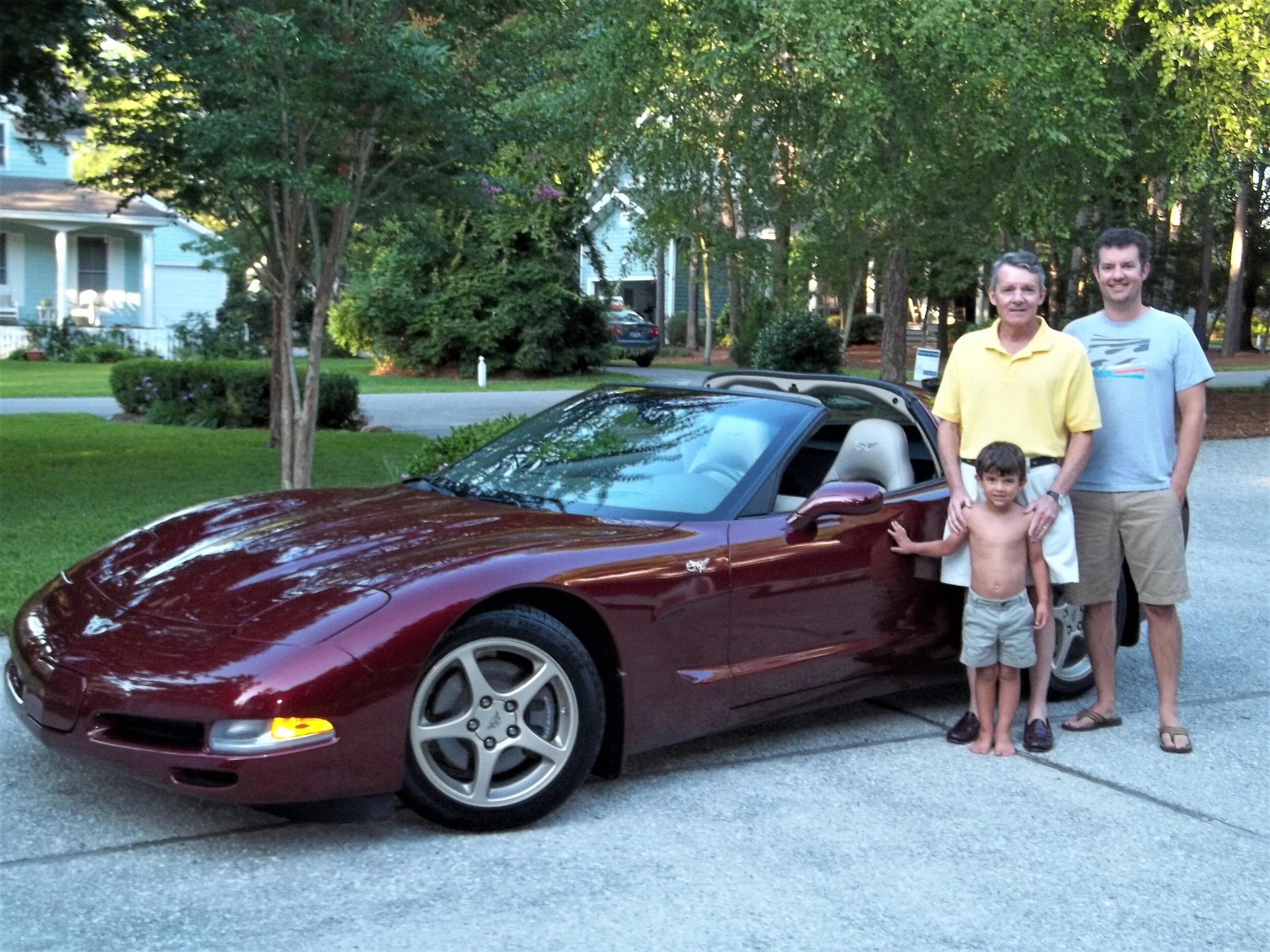 Steve, Taylor and Coale with Steve's "bucket list" 2003 corvette in 2014.