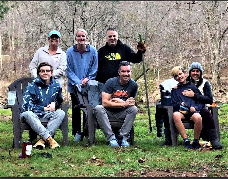 Jack Farmer, Allison Farmer, Carly Farmer, John Farmer, Taylor Harper (seated), Coale Harper and Kristi Harper at John and Allison's river house. in 2020. 