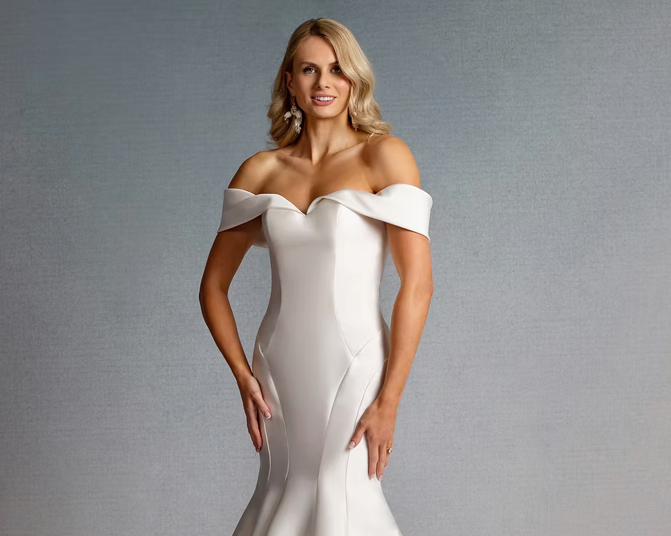Bride in Millie May wedding dress embracing her granmother 